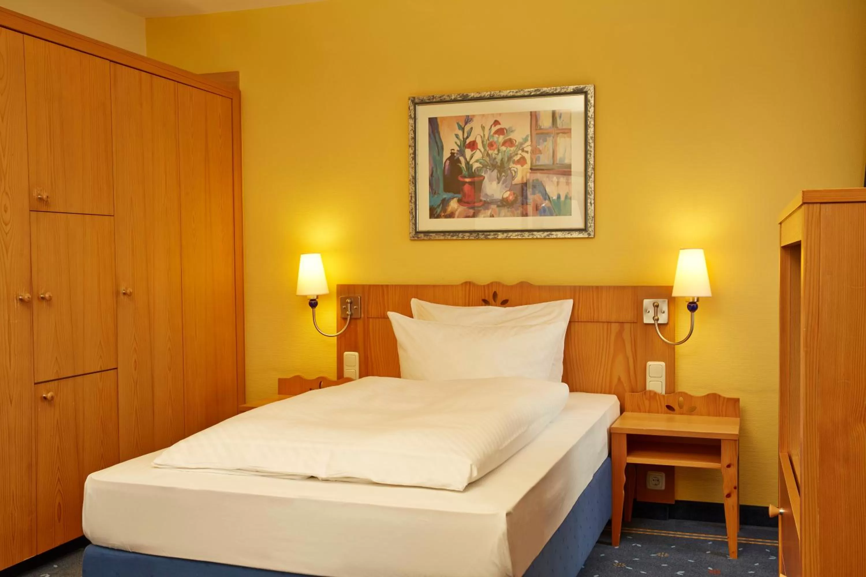 Bedroom, Bed in H+ Hotel & SPA Friedrichroda