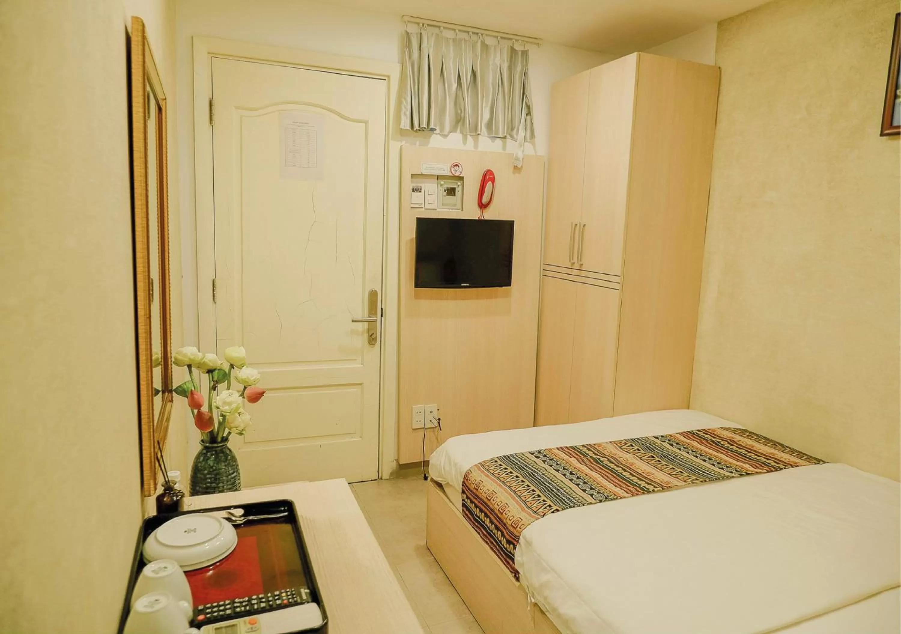 Bed in Galaxy Boutique Sai Gon Central Hotel