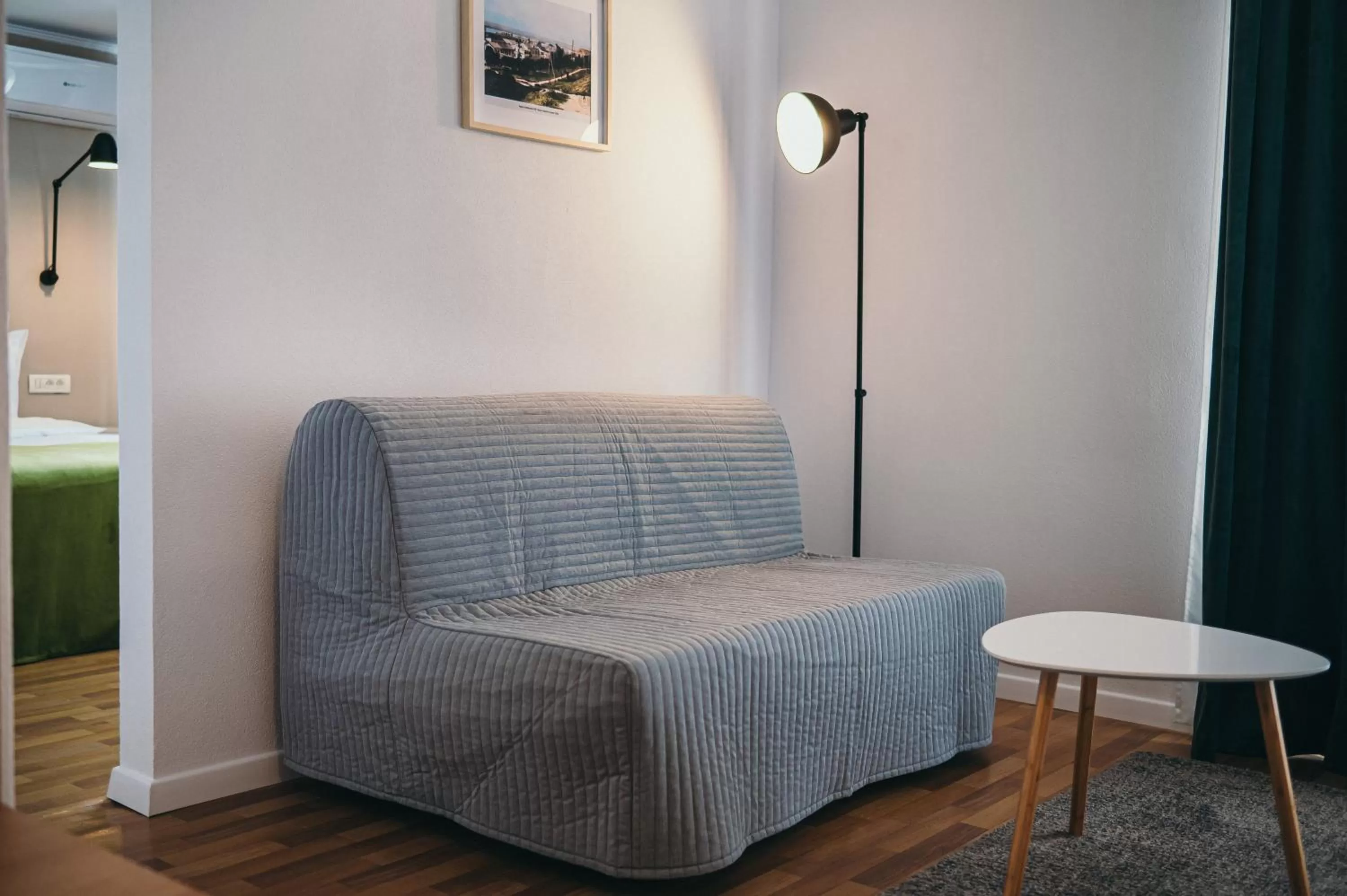 Living room, Bed in Nest Guesthouse