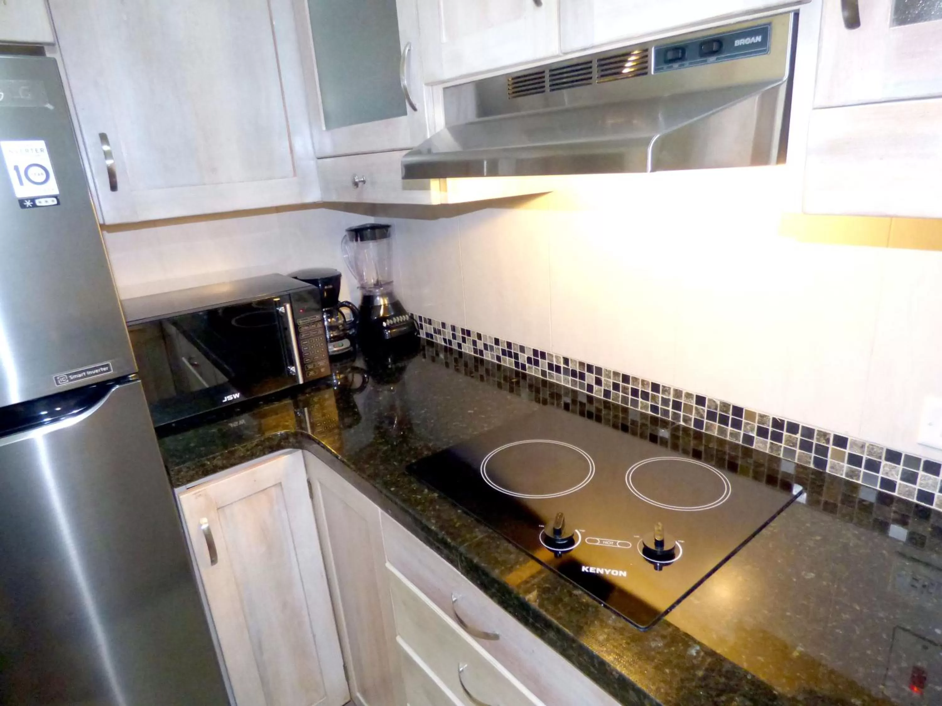 Kitchen or kitchenette in Beach One Bedroom Suite A22