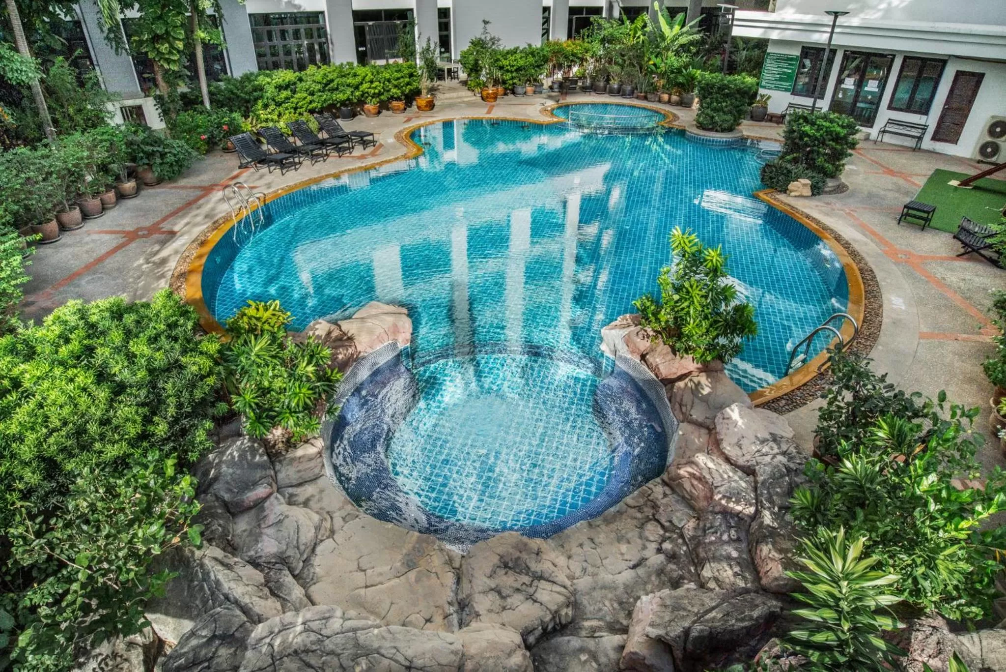 Swimming pool in Mike Garden Resort - SHA EXTAR PLUS