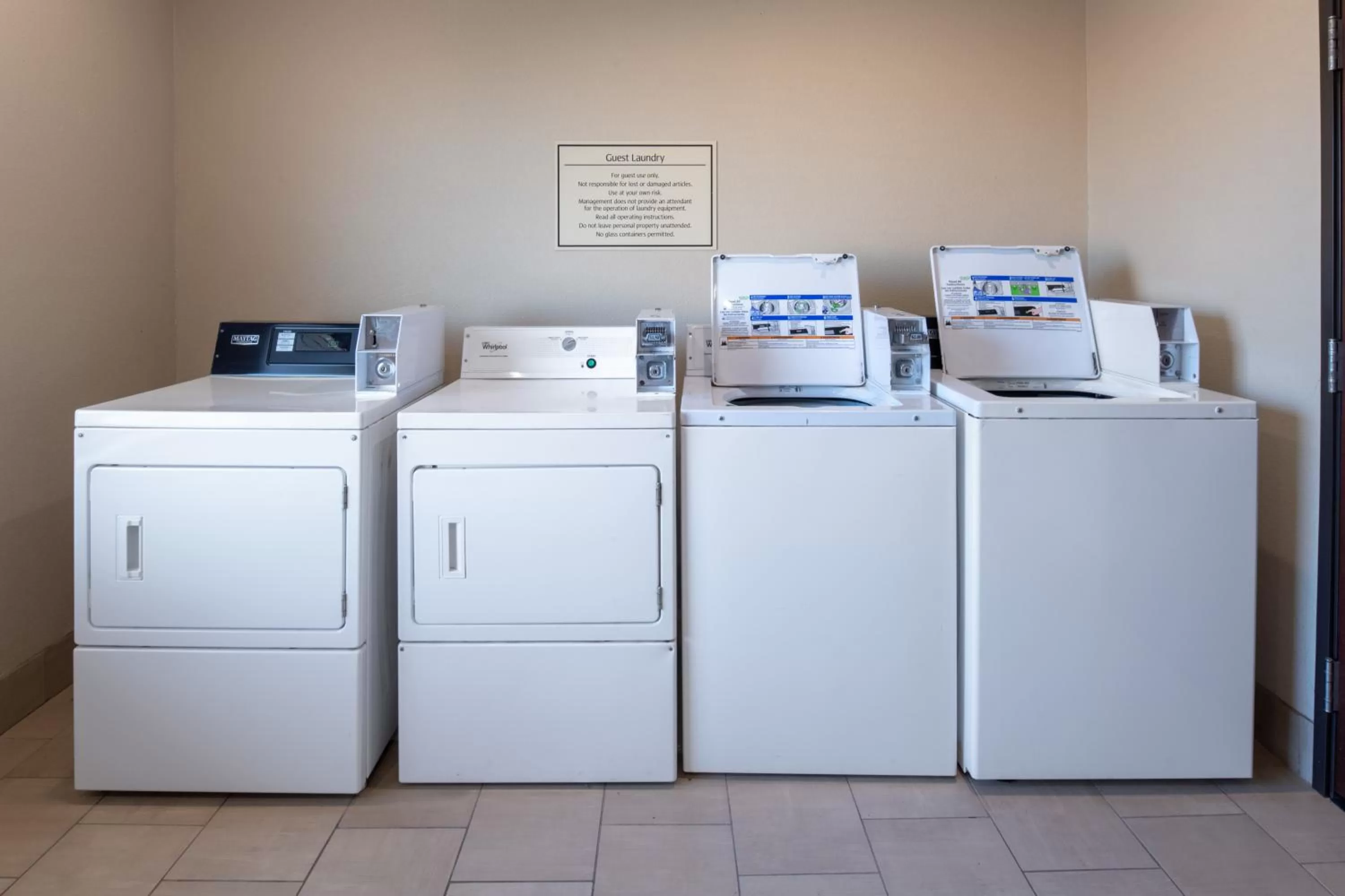 laundry in Home Away Kitchen Suites Enid