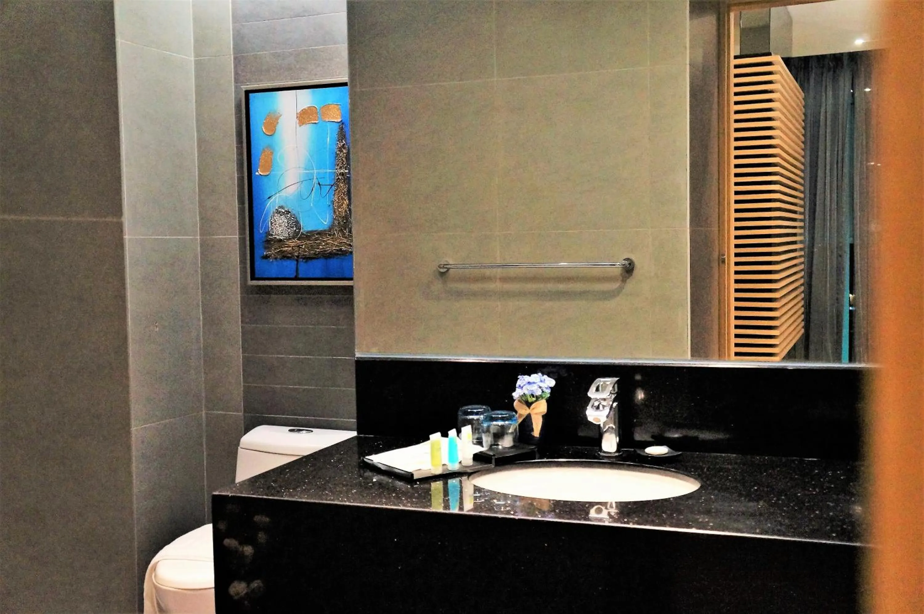 Bed in Greens Hotel & Suites