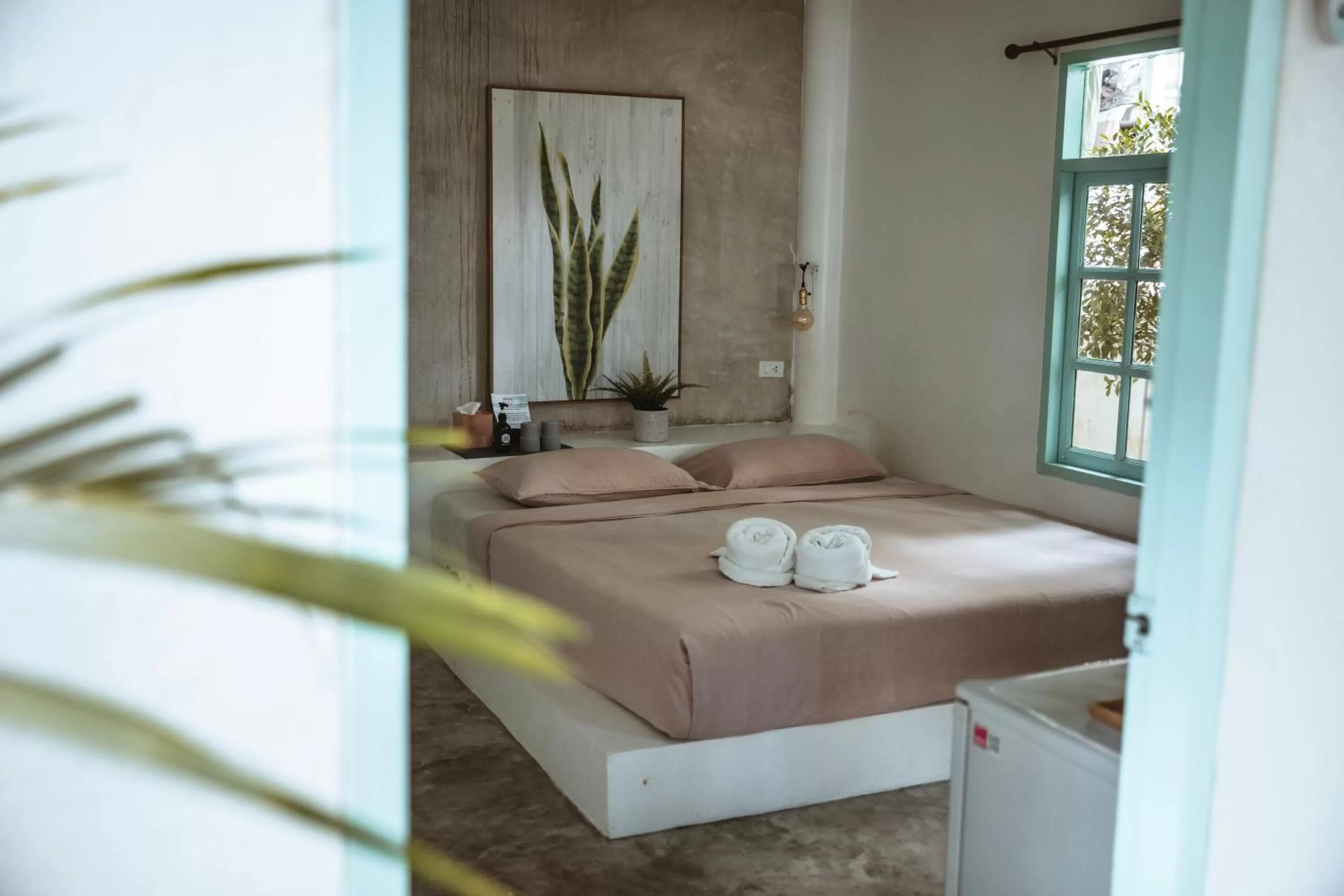 Bed in Indie Beach Bungalows