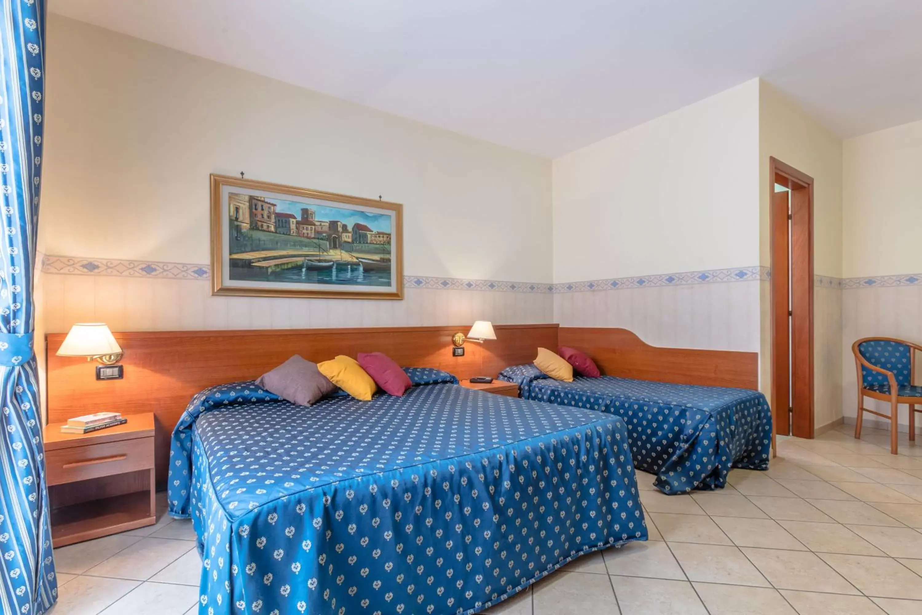 Triple Room in Hotel Traiano Triple Room in Hotel Traiano