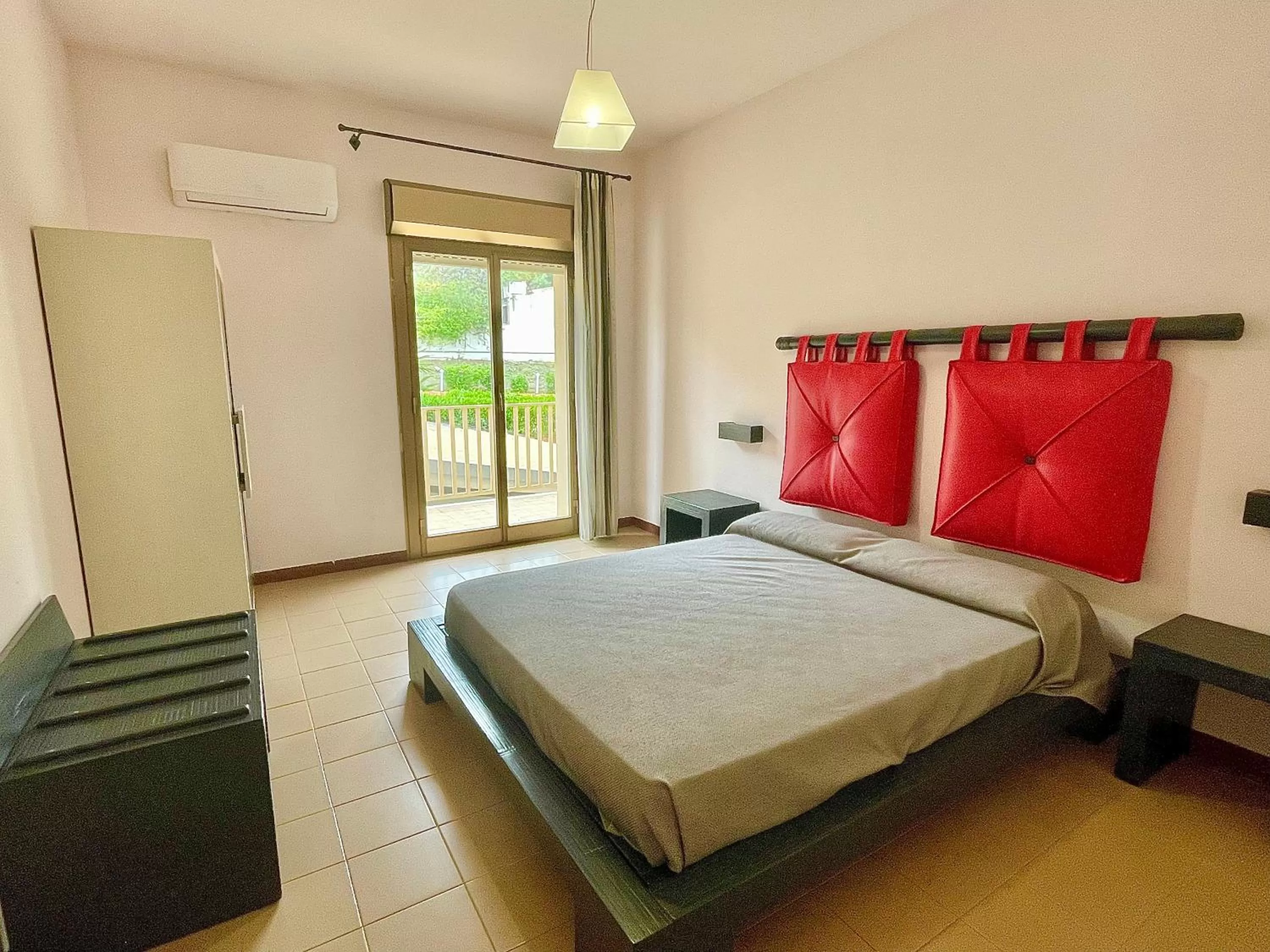 Bed in Aparthotel Isabella