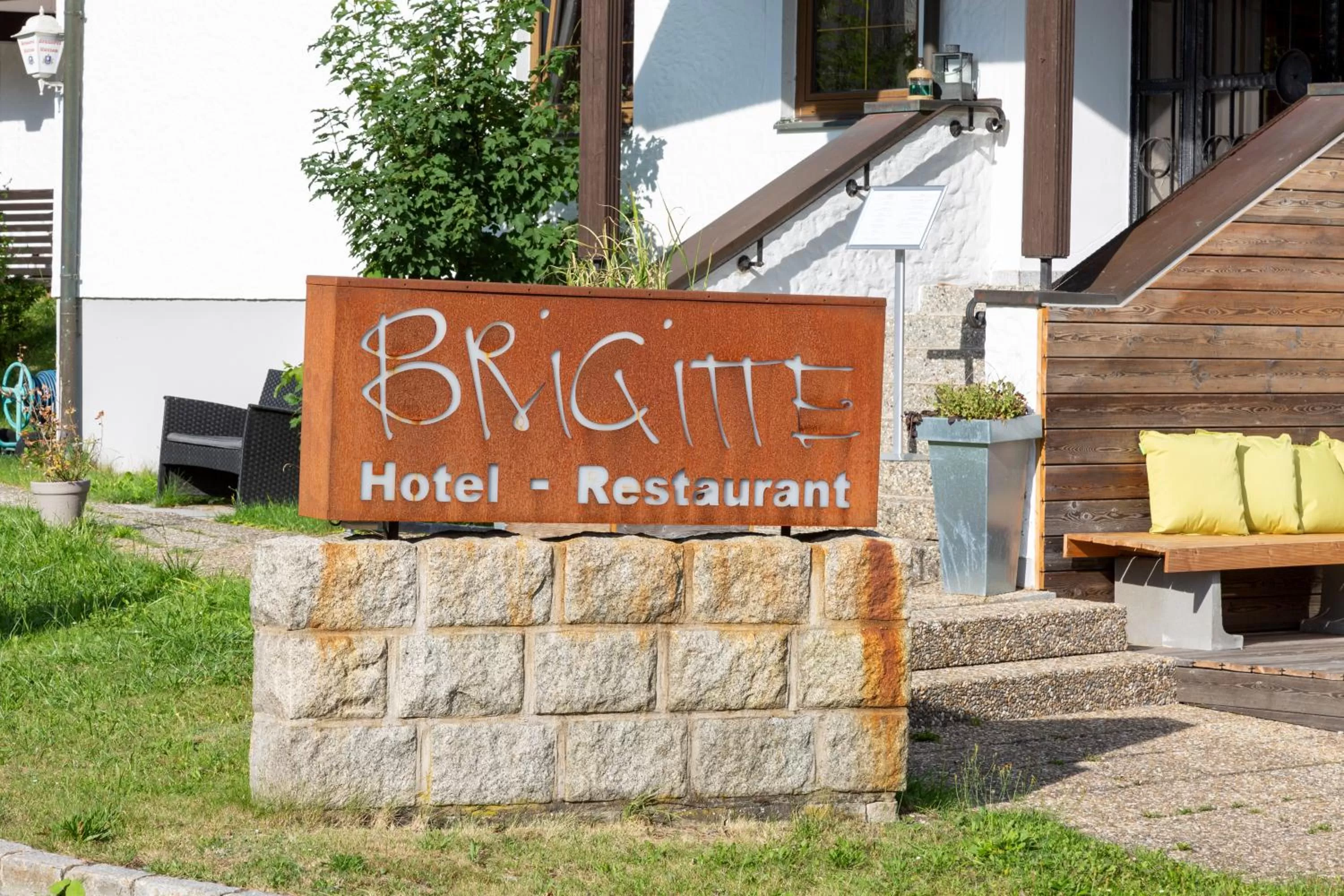 Property building, Property Logo/Sign in Hotel Restaurant Brigitte