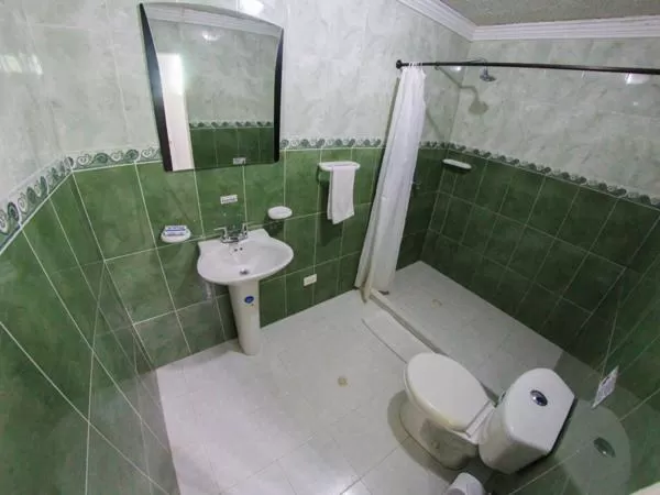 Bathroom in Casa Royal Palm Inn