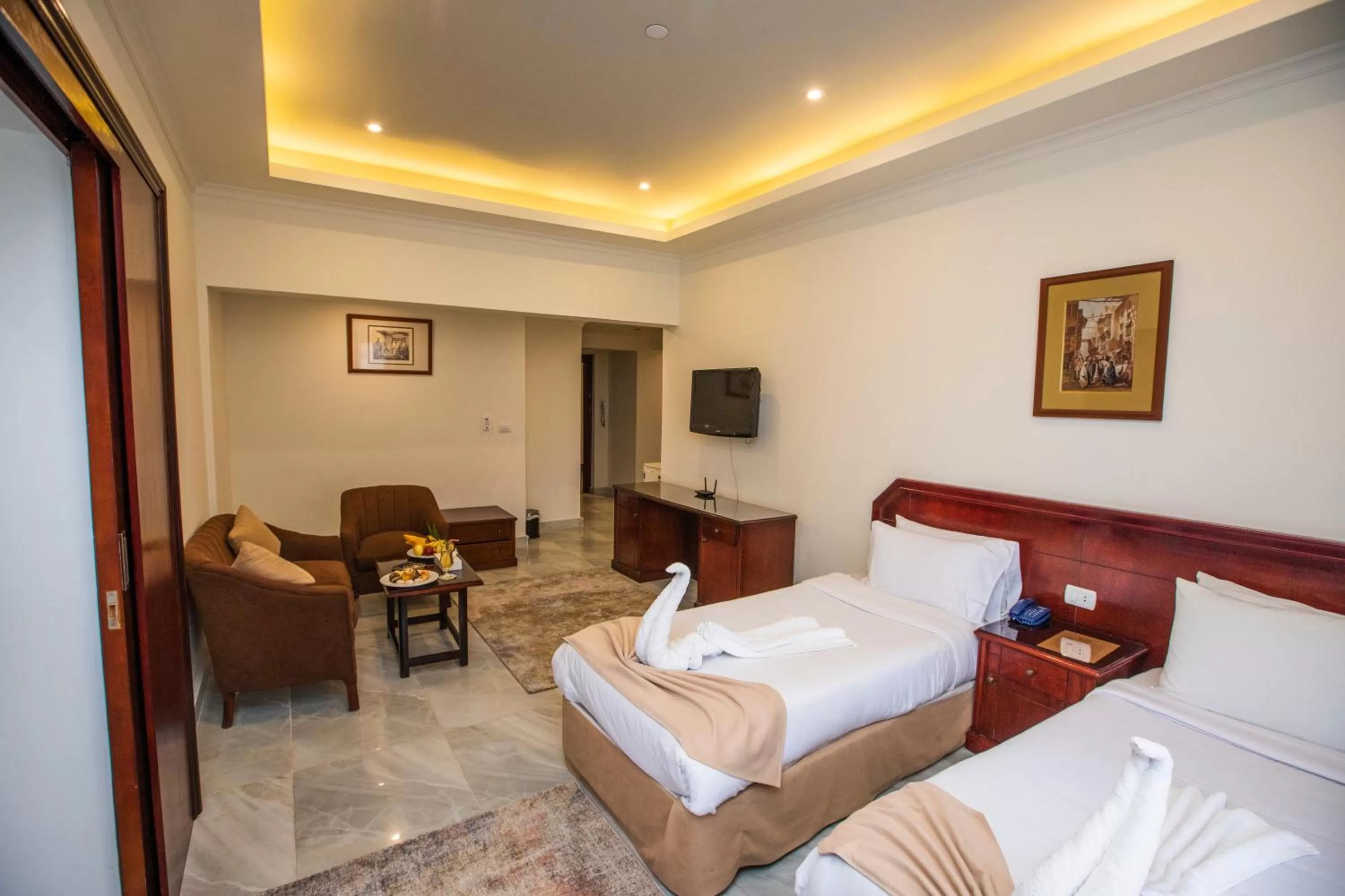 Living room, Bed in AIFU Hotel El Montazah Alexandria