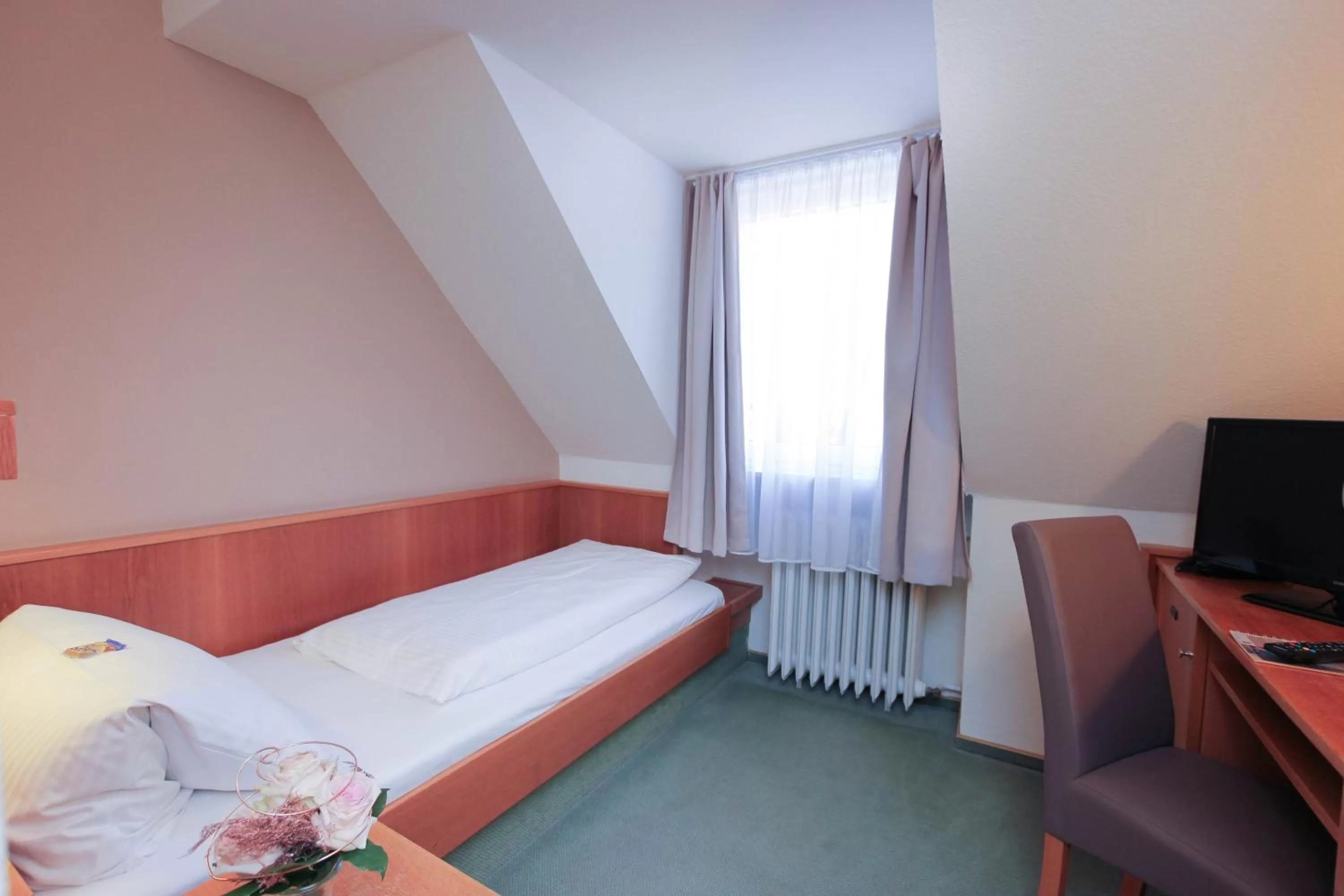 Bed in City Hotel Würzburg