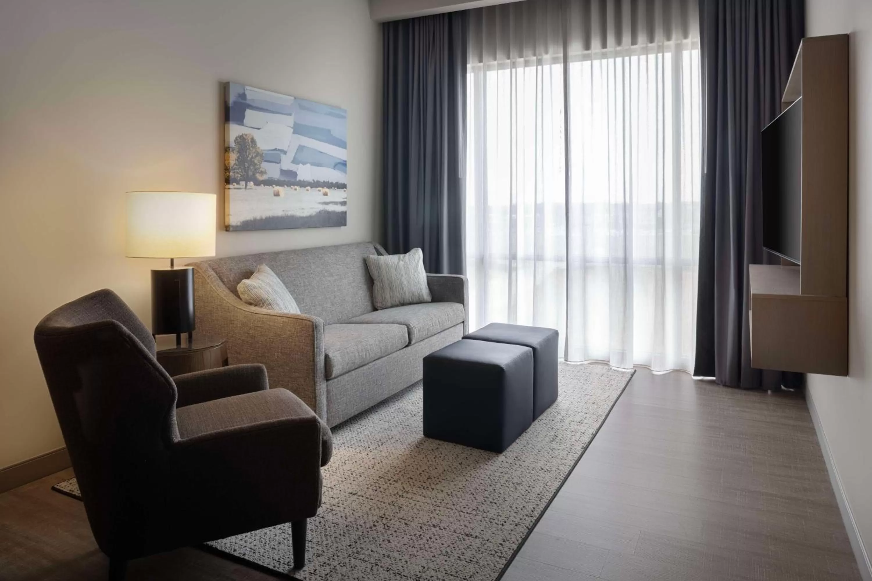 Living room in Embassy Suites By Hilton Bowling Green