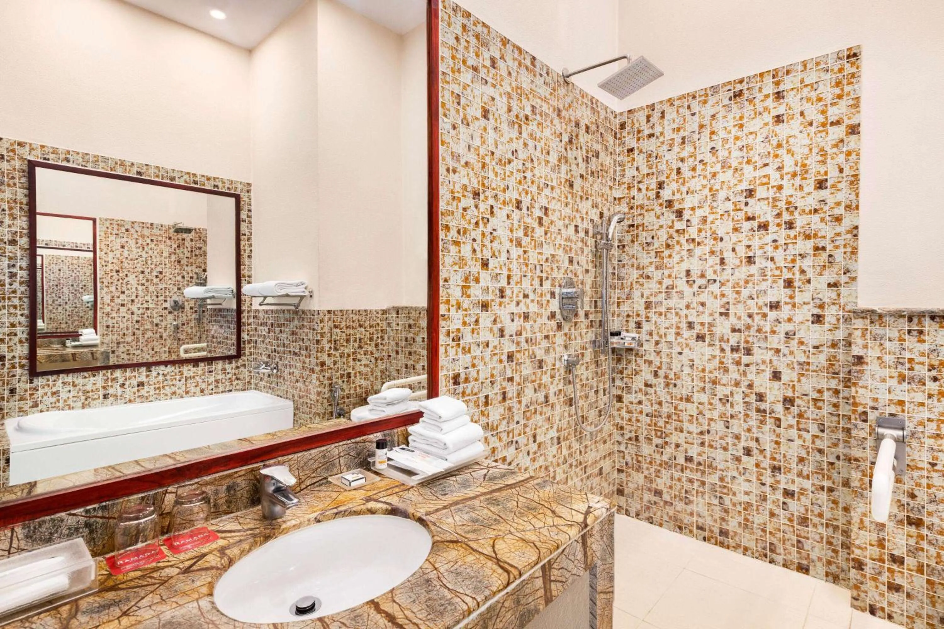 Bathroom in Ramada by Wyndham Jaipur Jaisinghpura