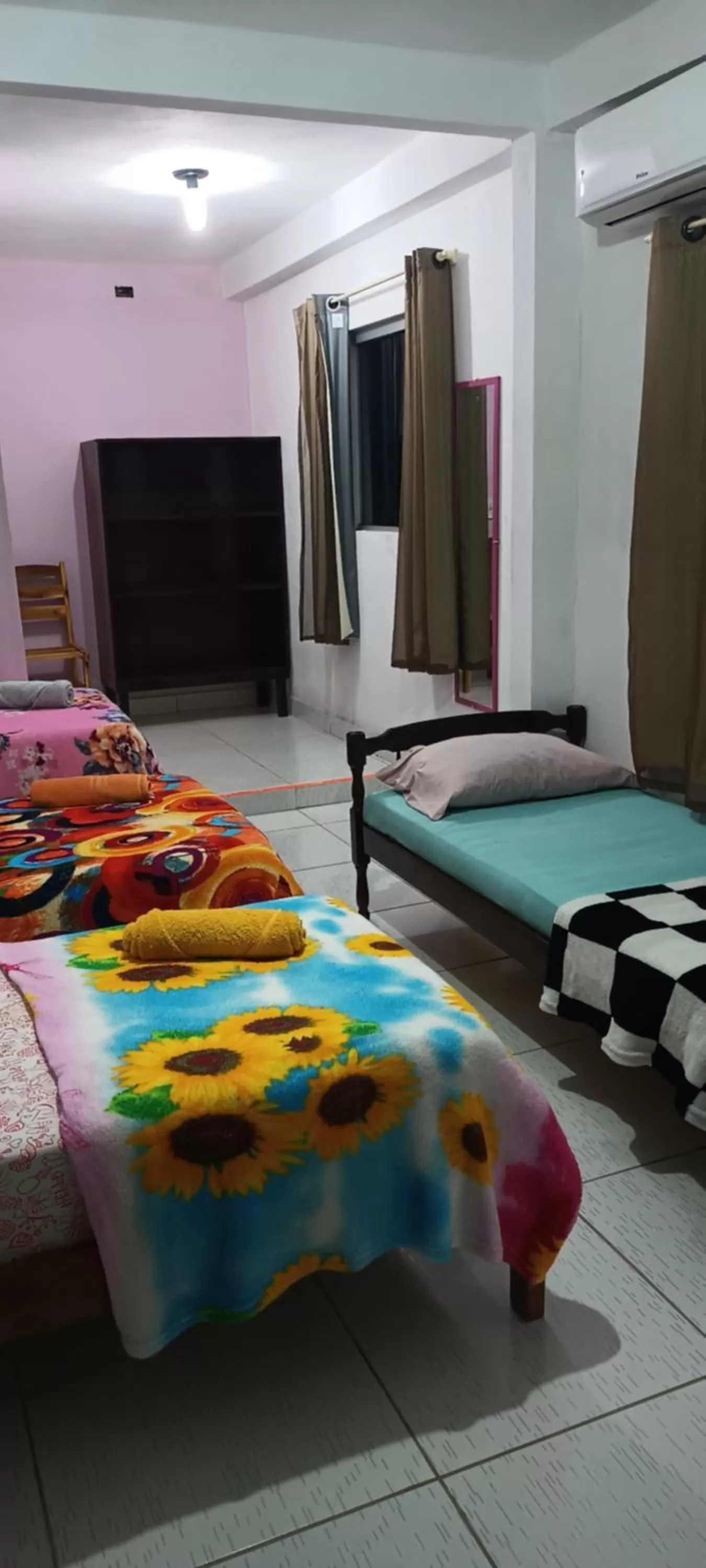 Bed in Pousada dos Ventos