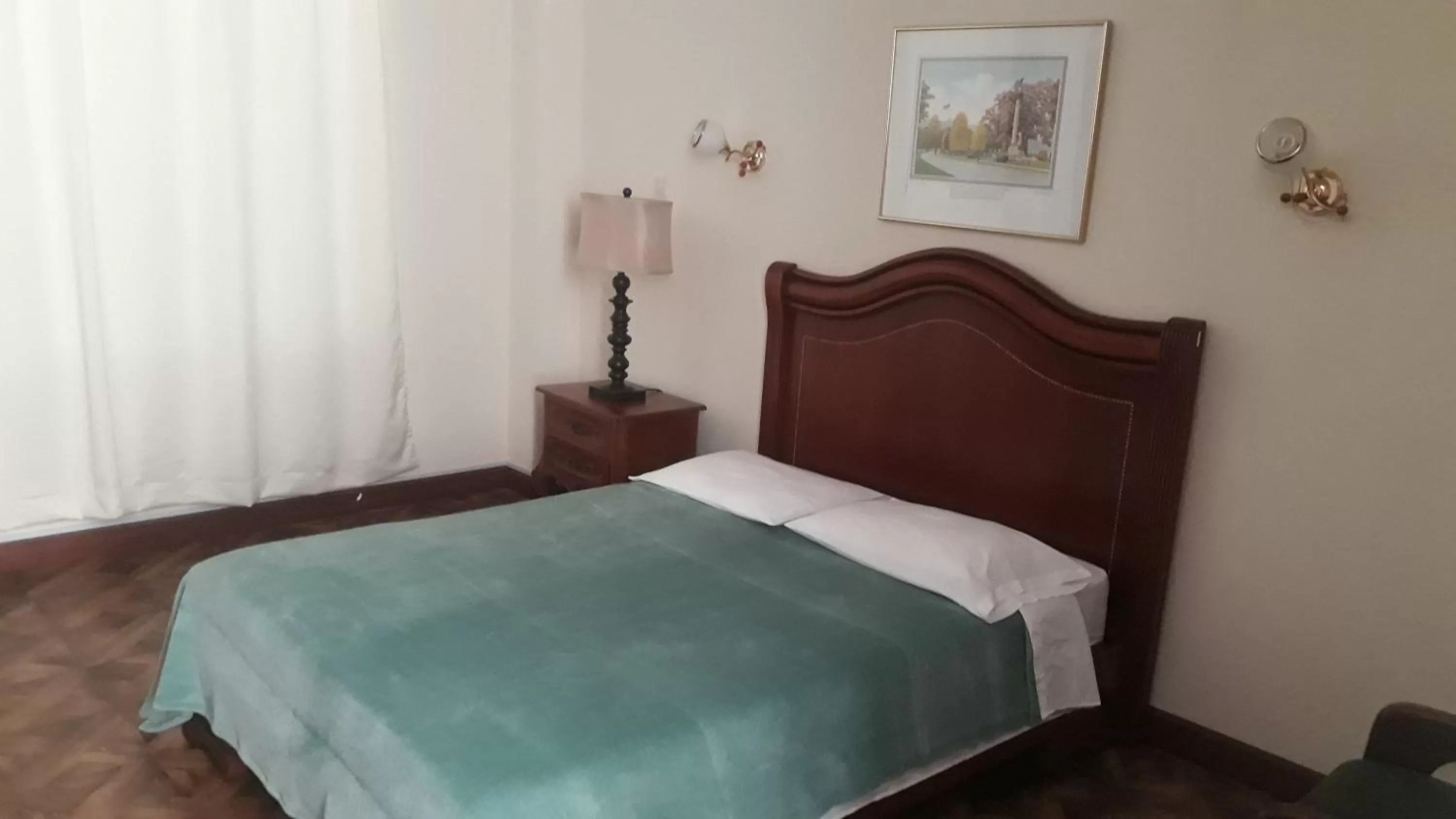 Bed in El Cardenal Hotel