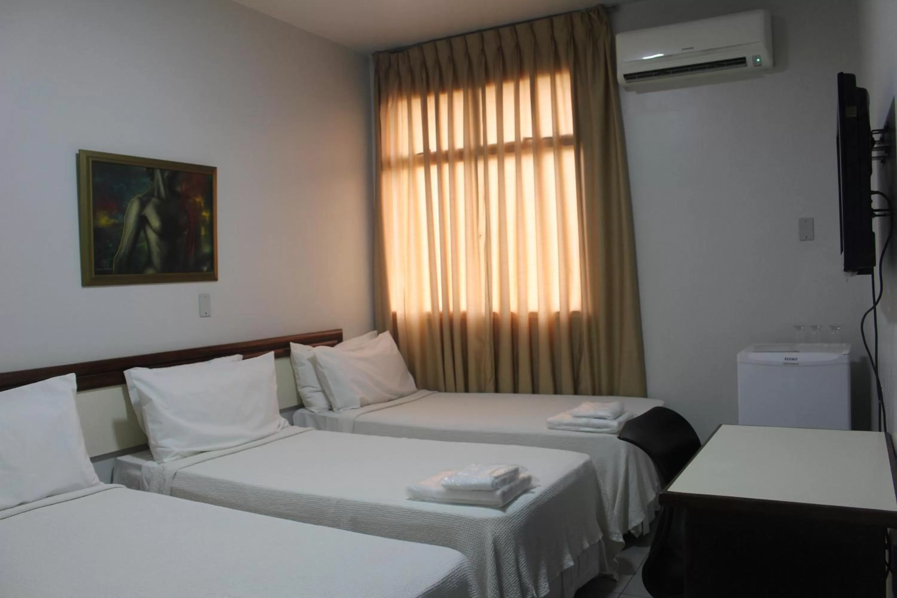 Bed in Hotel Oscar Econômico