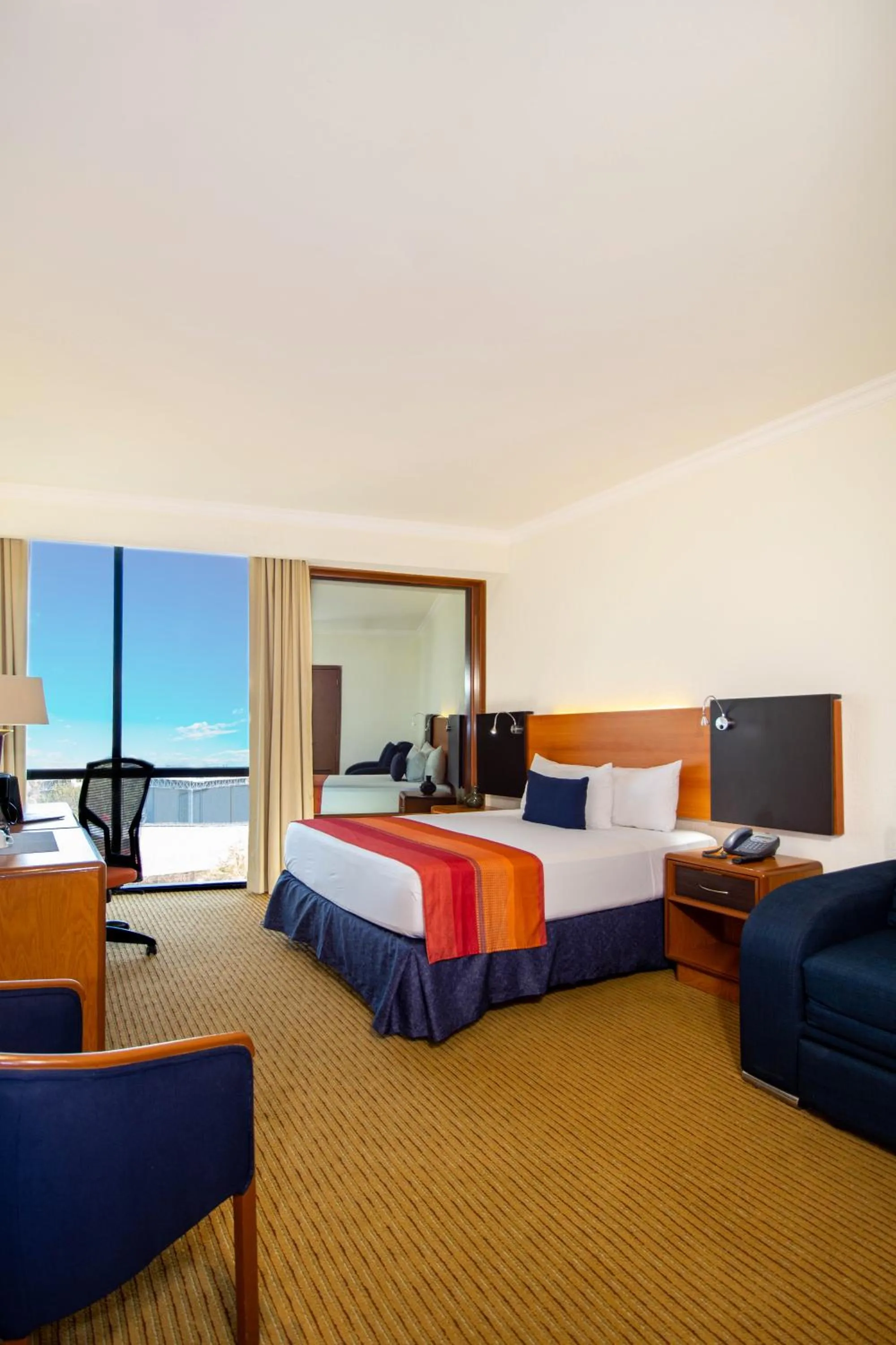 View (from property/room), Bed in Hotel Guadalajara Plaza Expo