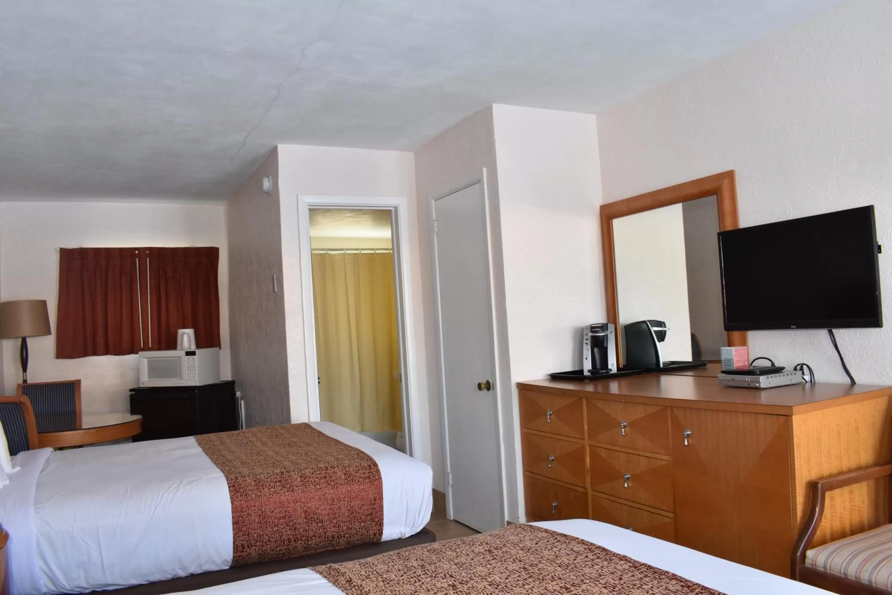 Bed in Blue Water Motel