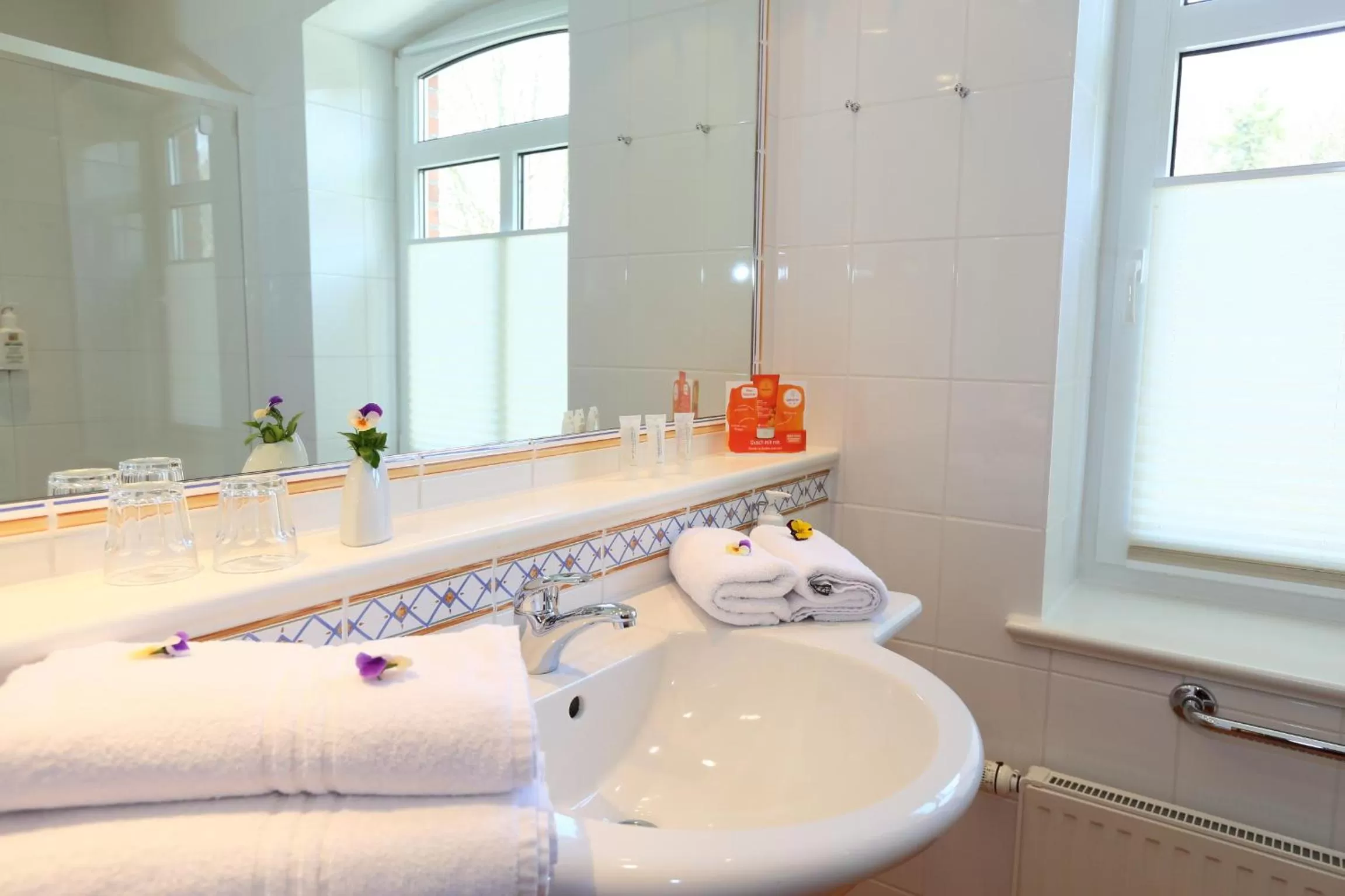 Bathroom in Hotel&Häuser HF GmbH