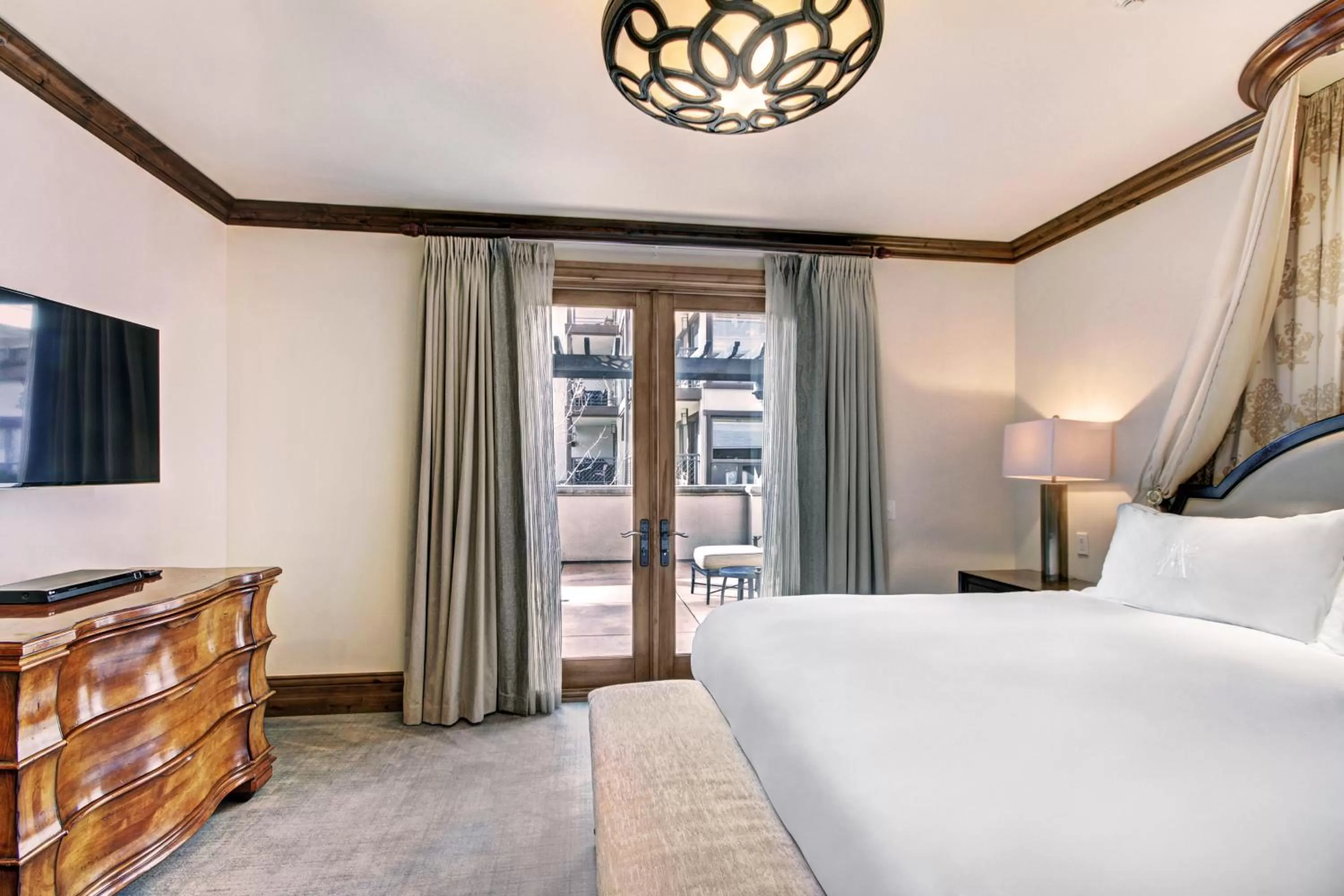 Bed in The Arrabelle at Vail Square, a RockResort, by Vail Resorts