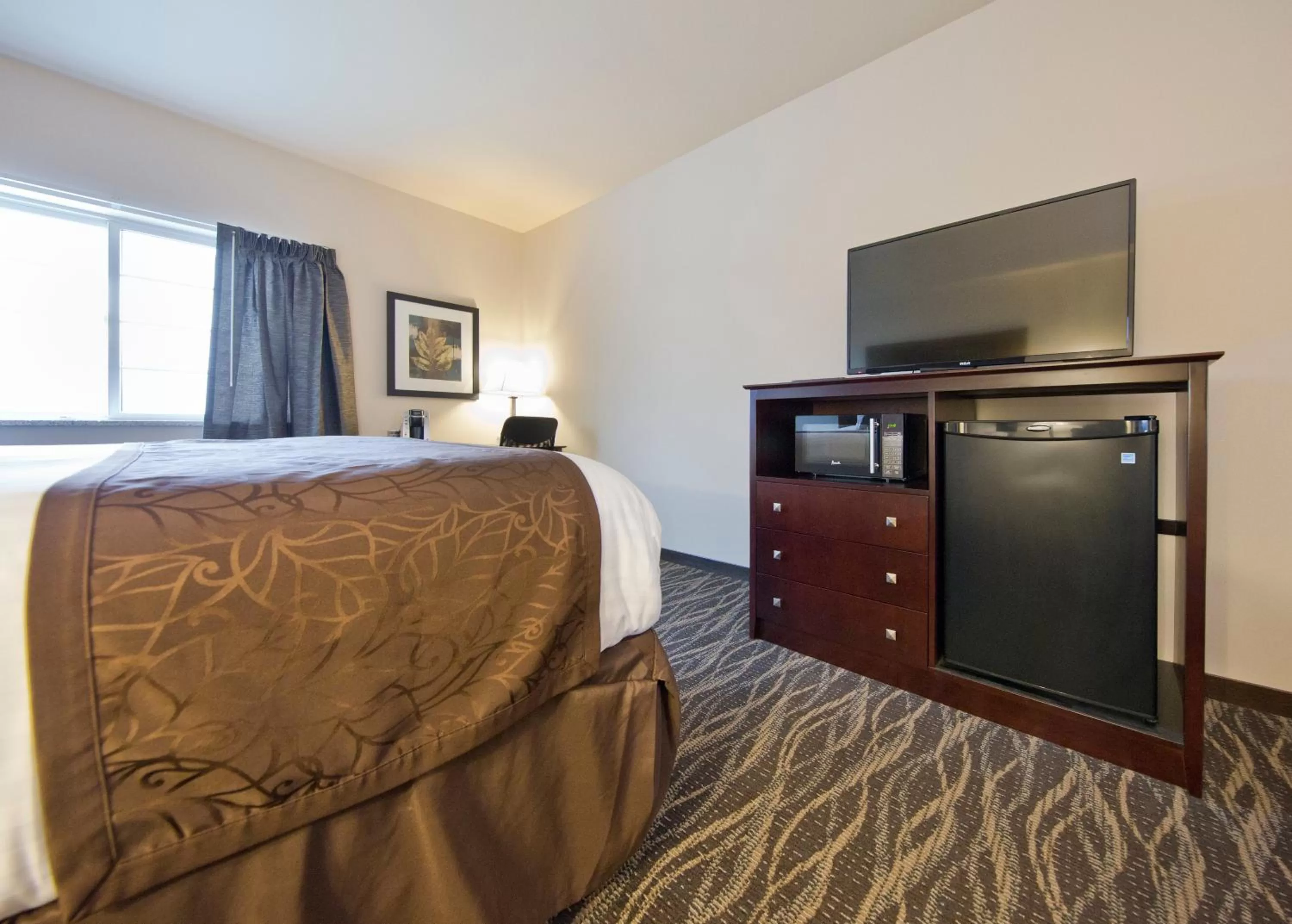 Bed in Cobblestone Inn & Suites - Boone