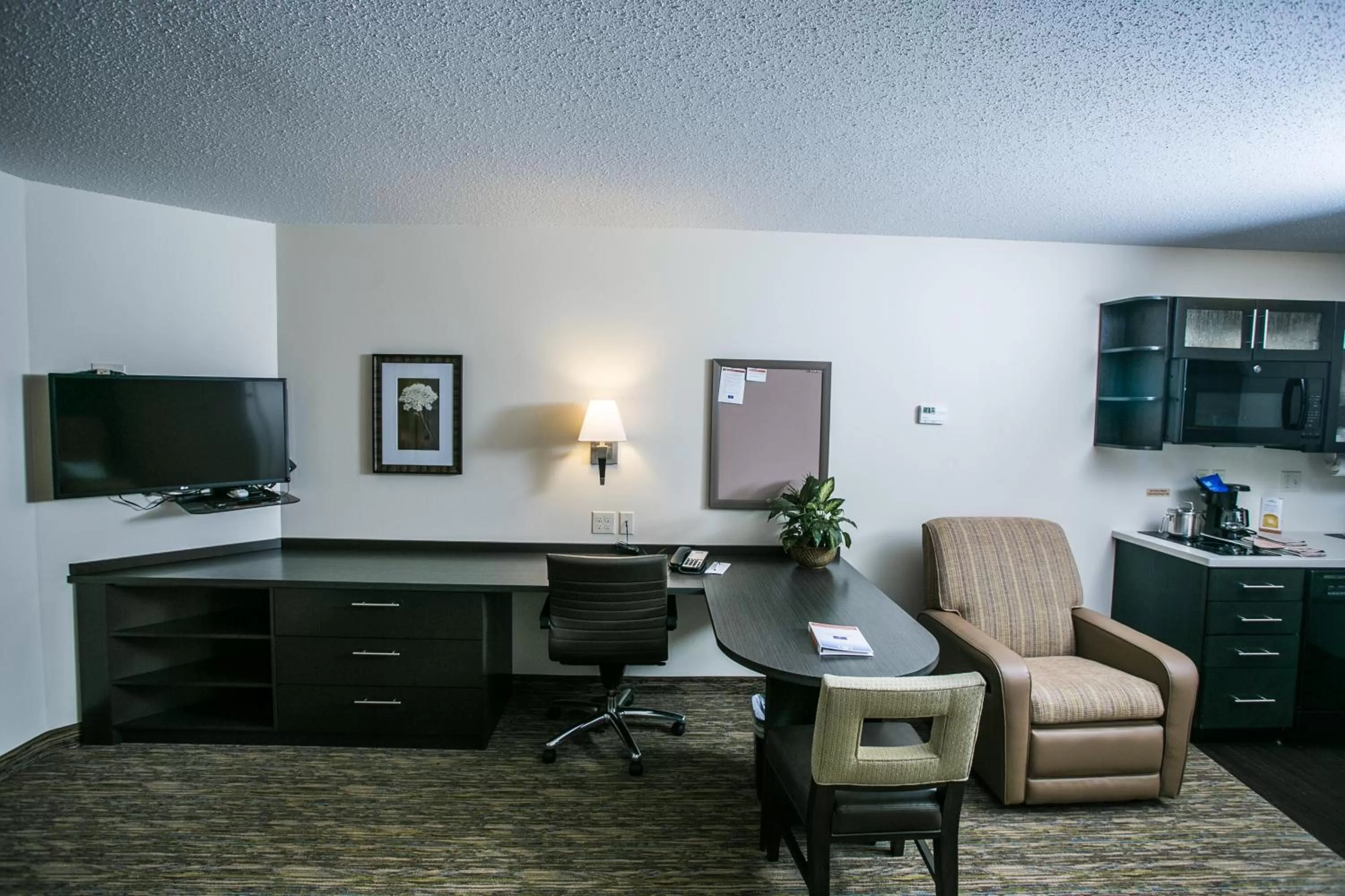 Photo of the whole room in Candlewood Suites Fargo-North Dakota State University by IHG