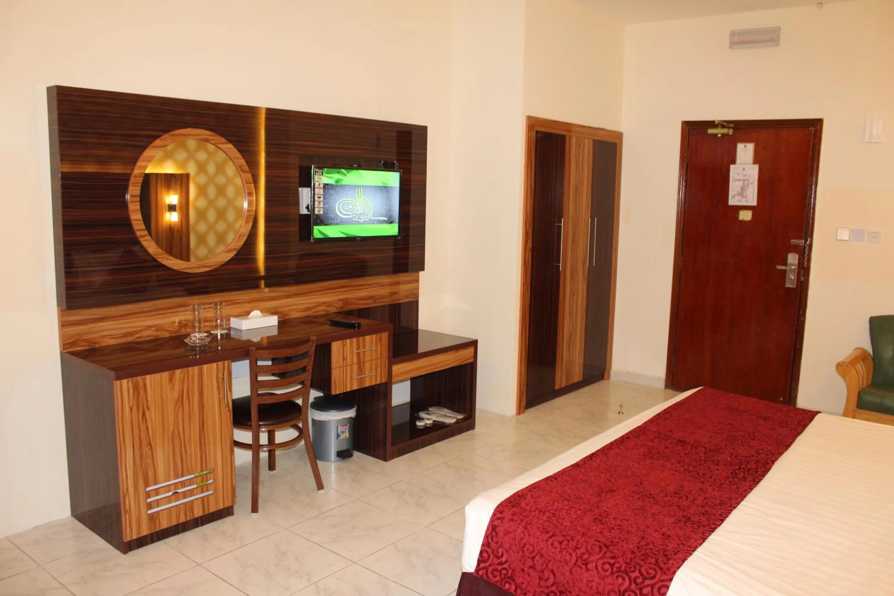 Bed in Grand Nova Hotel