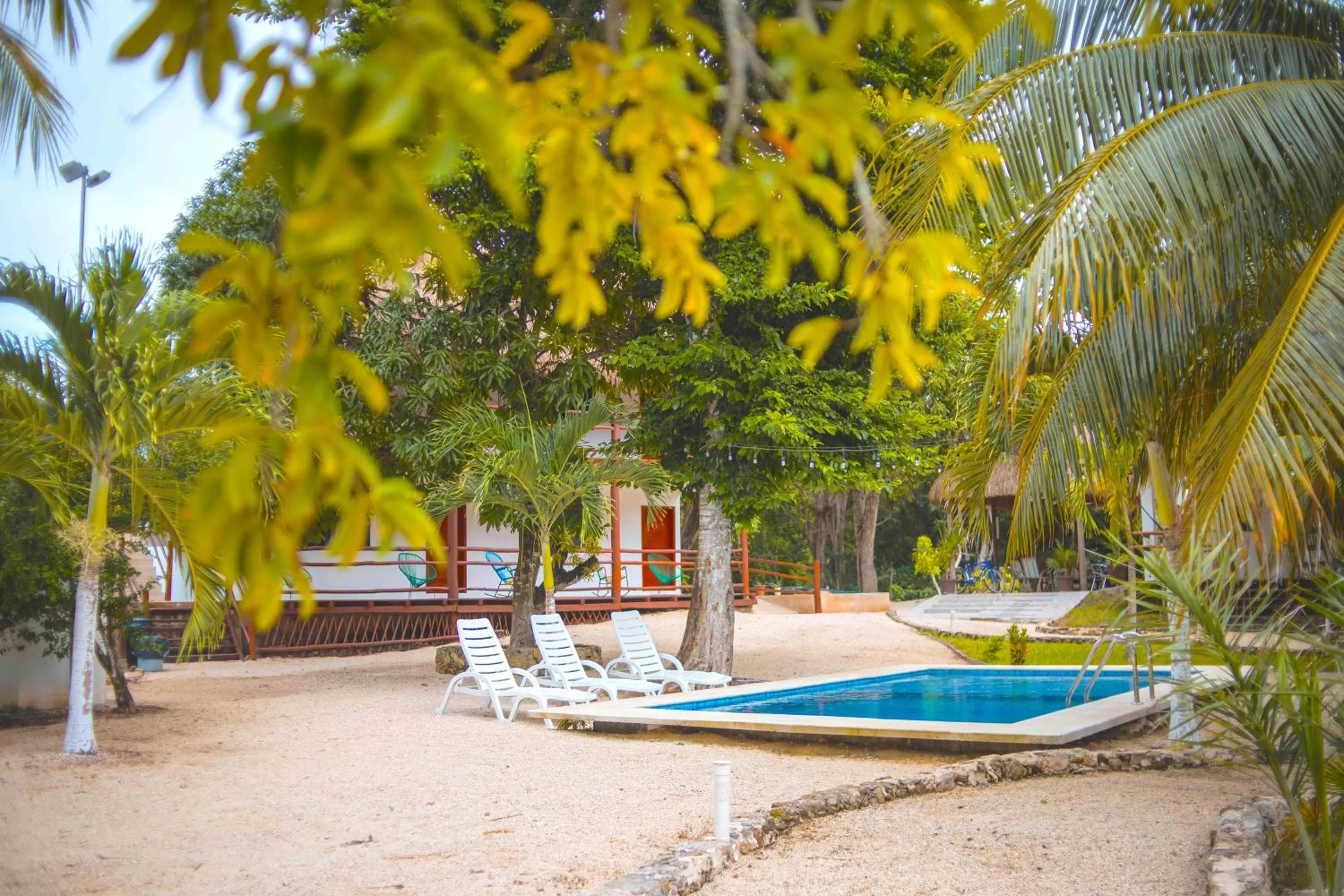 Swimming pool in Royal Palm Bacalar Cabañas & Lagoon Club