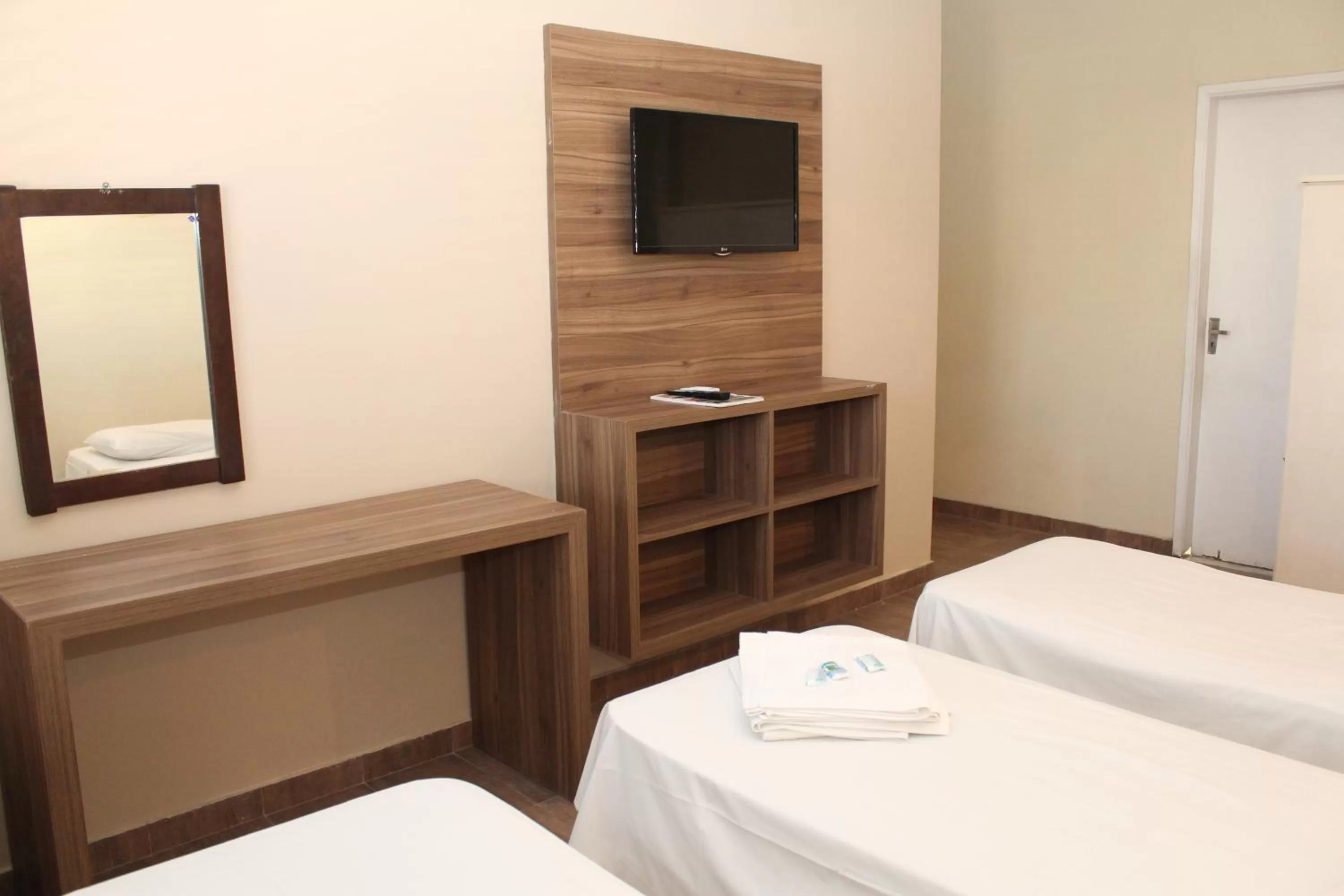 Decorative detail, TV/Entertainment Center in Espigão Palace Hotel