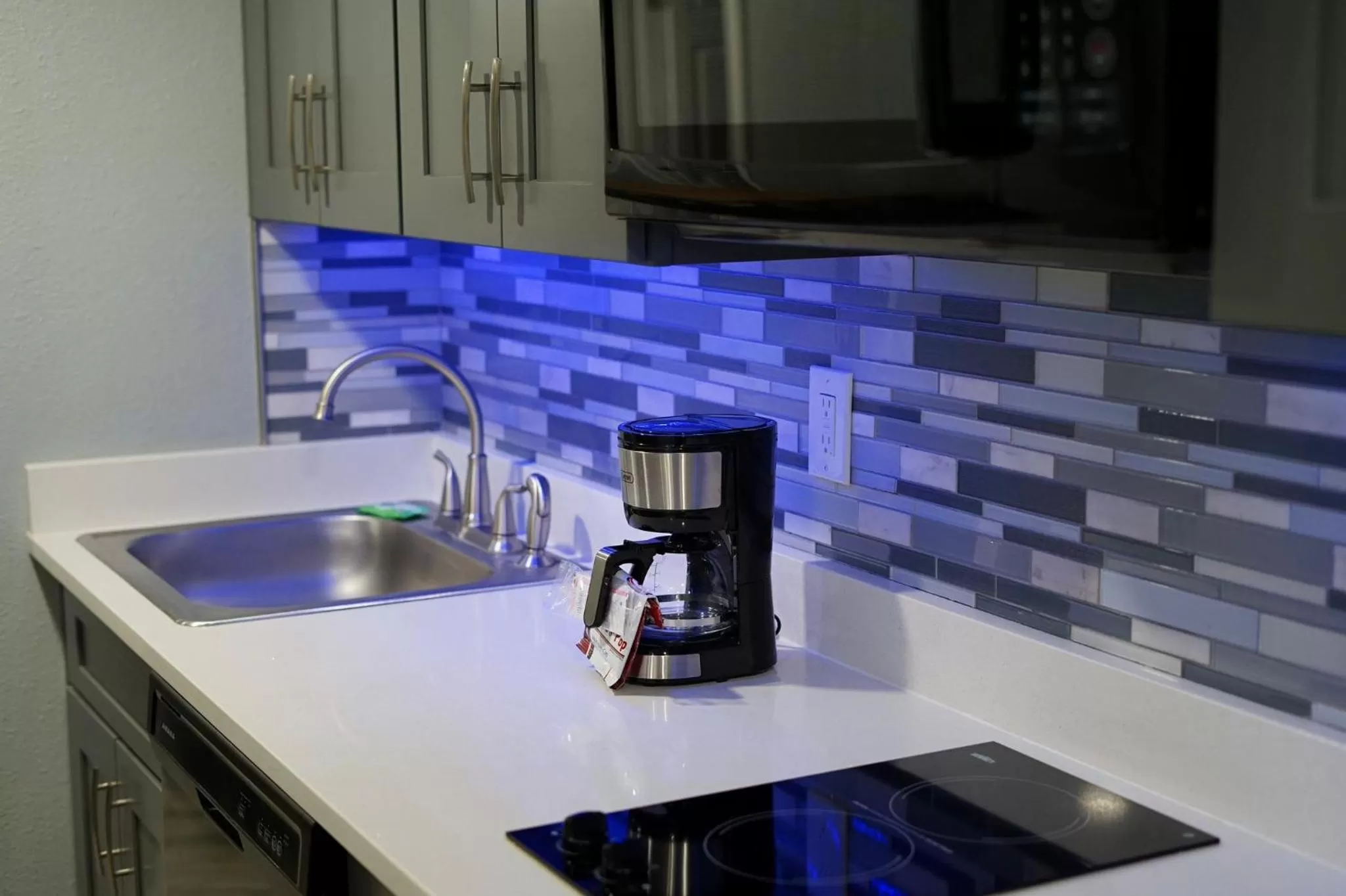 Kitchen or kitchenette in Celebration Suites