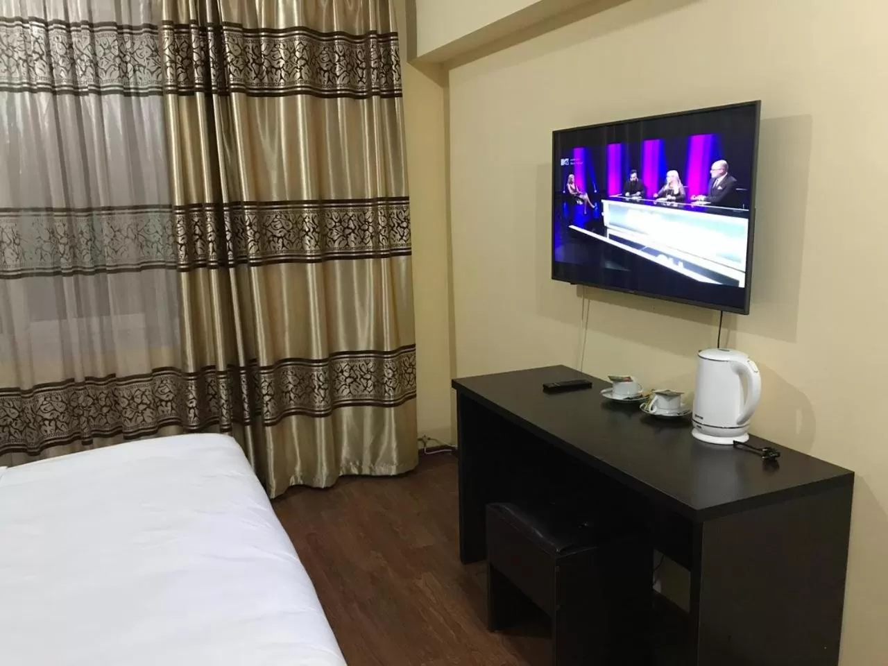 TV/Entertainment Center in Altai Business Hotel