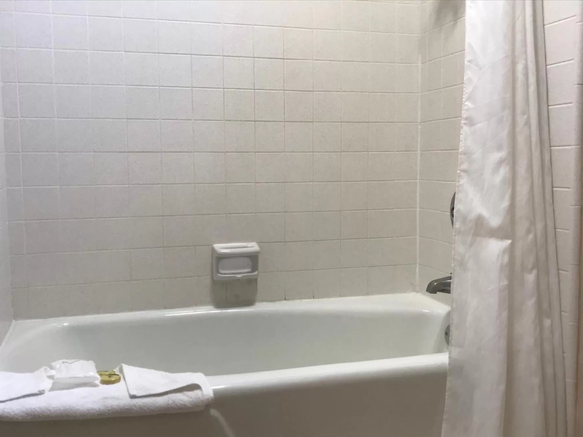 Bathroom in Olive Tree Inn & Suites