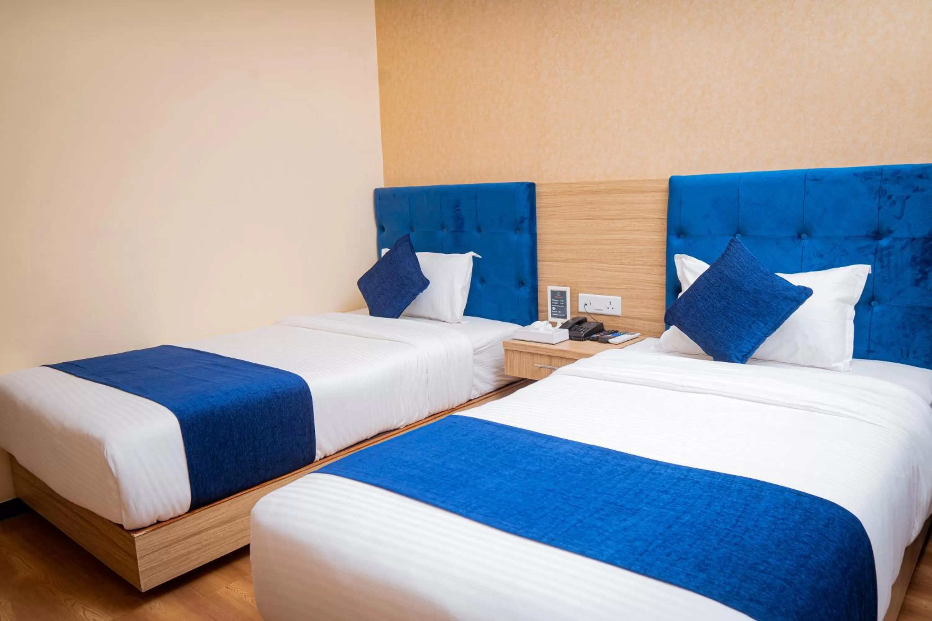 Bed in Majestic Lake Front Hotel & Suites