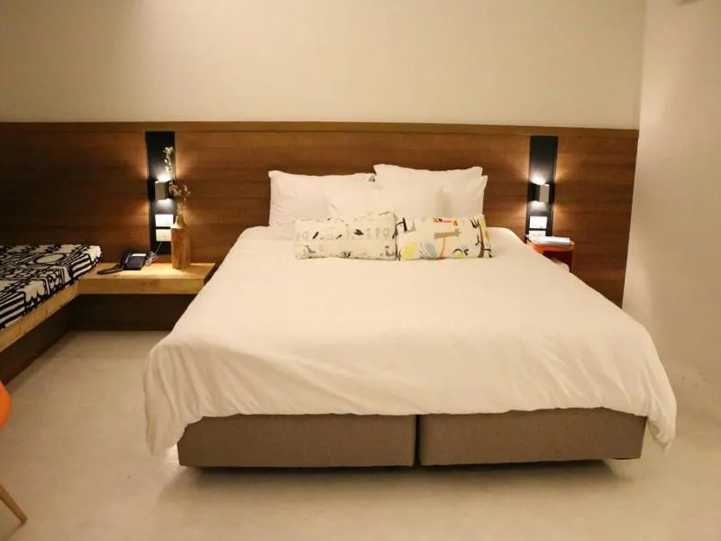 Bed in NornDee Hotel