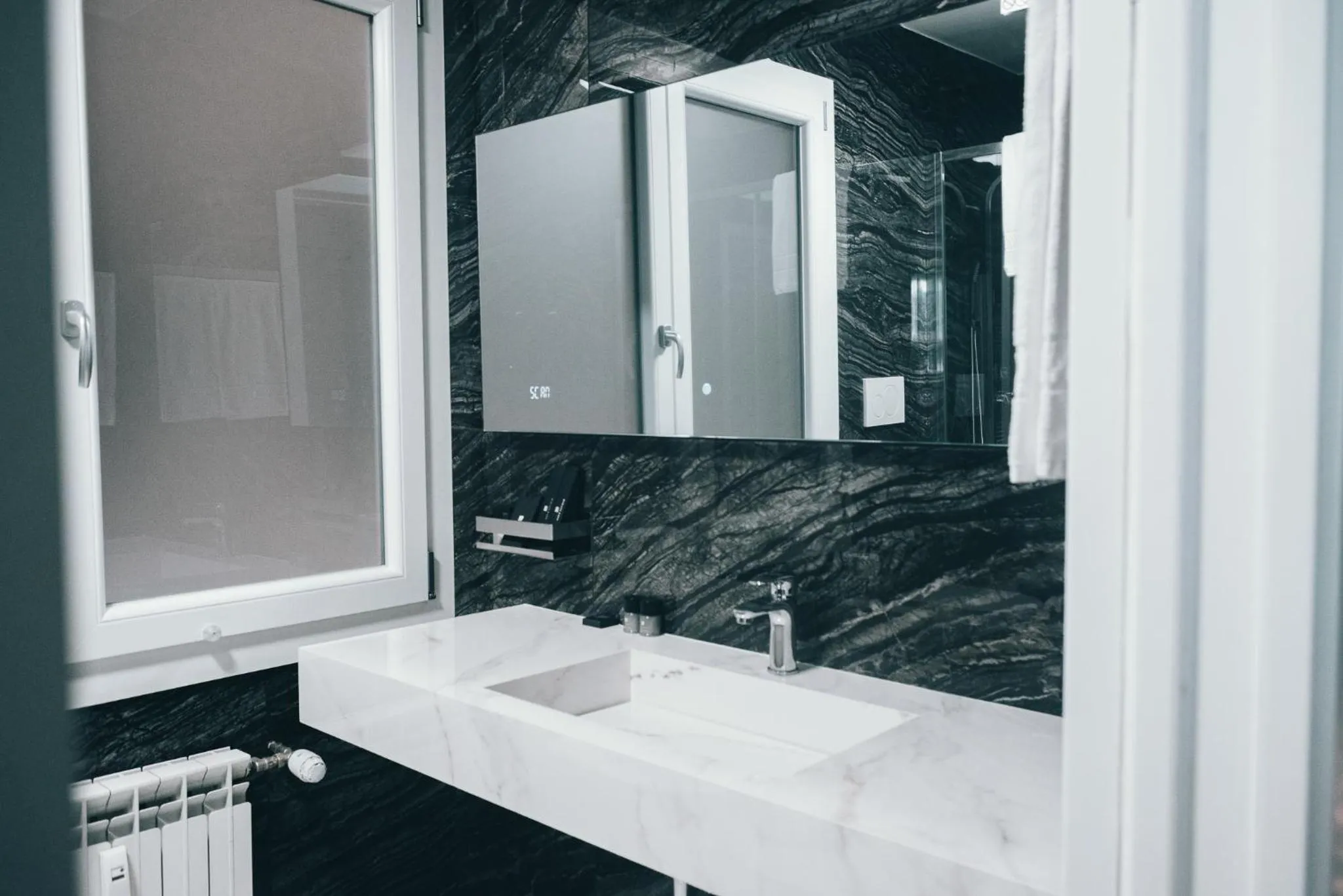 Bathroom in Gregorio VII Luxury Suites San Damaso