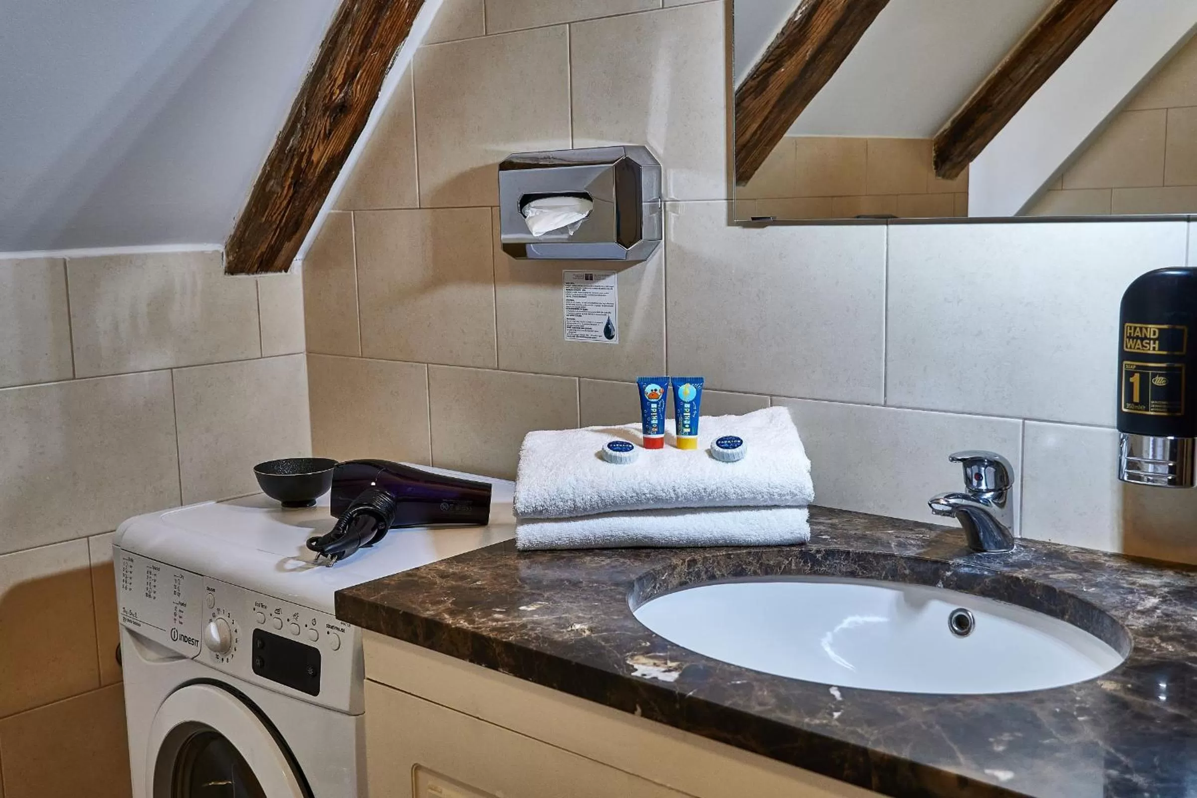 Toilet in Three Golden Crowns Apartments