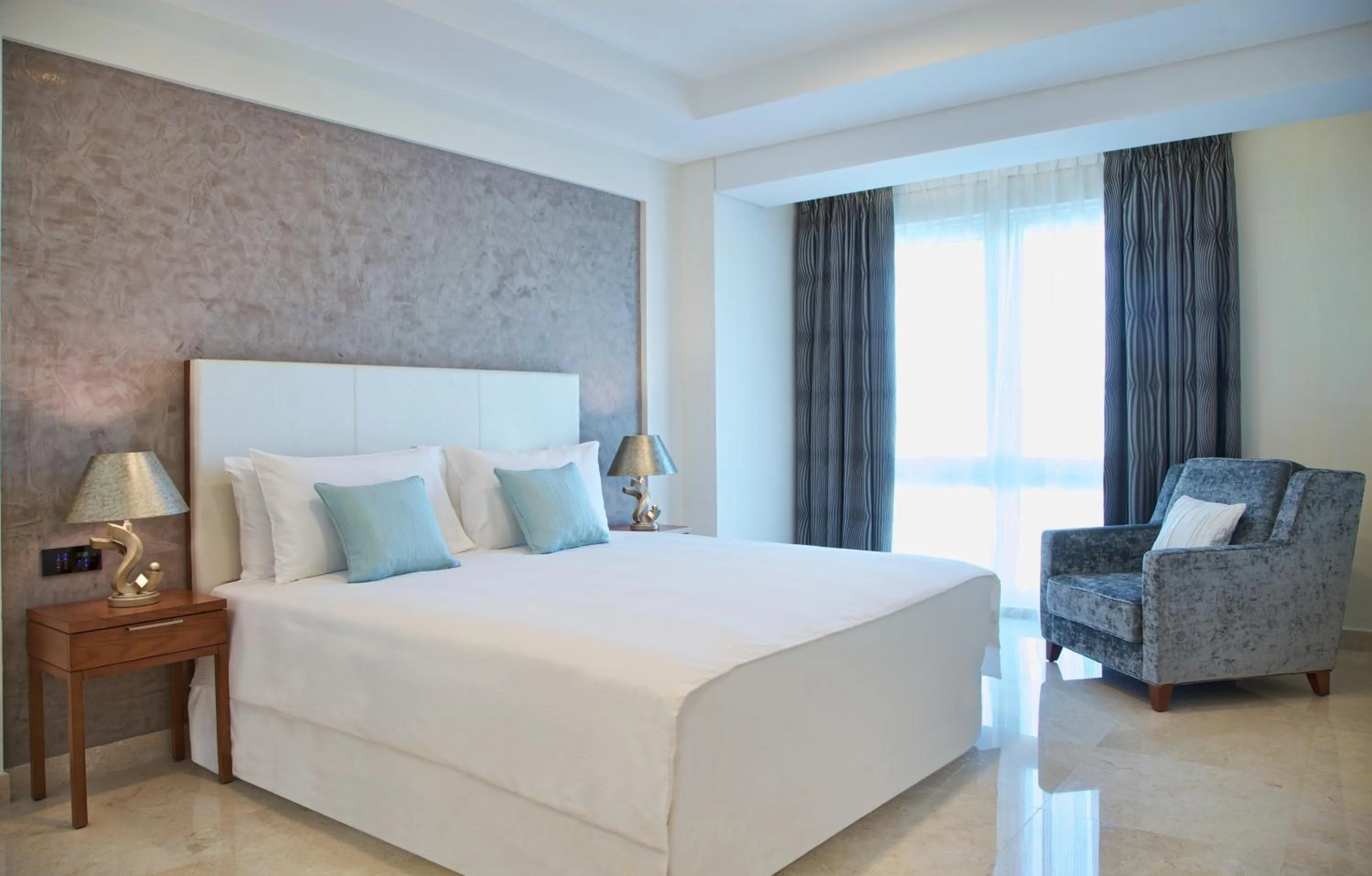 Bedroom in Millennium Executive Apartments Muscat