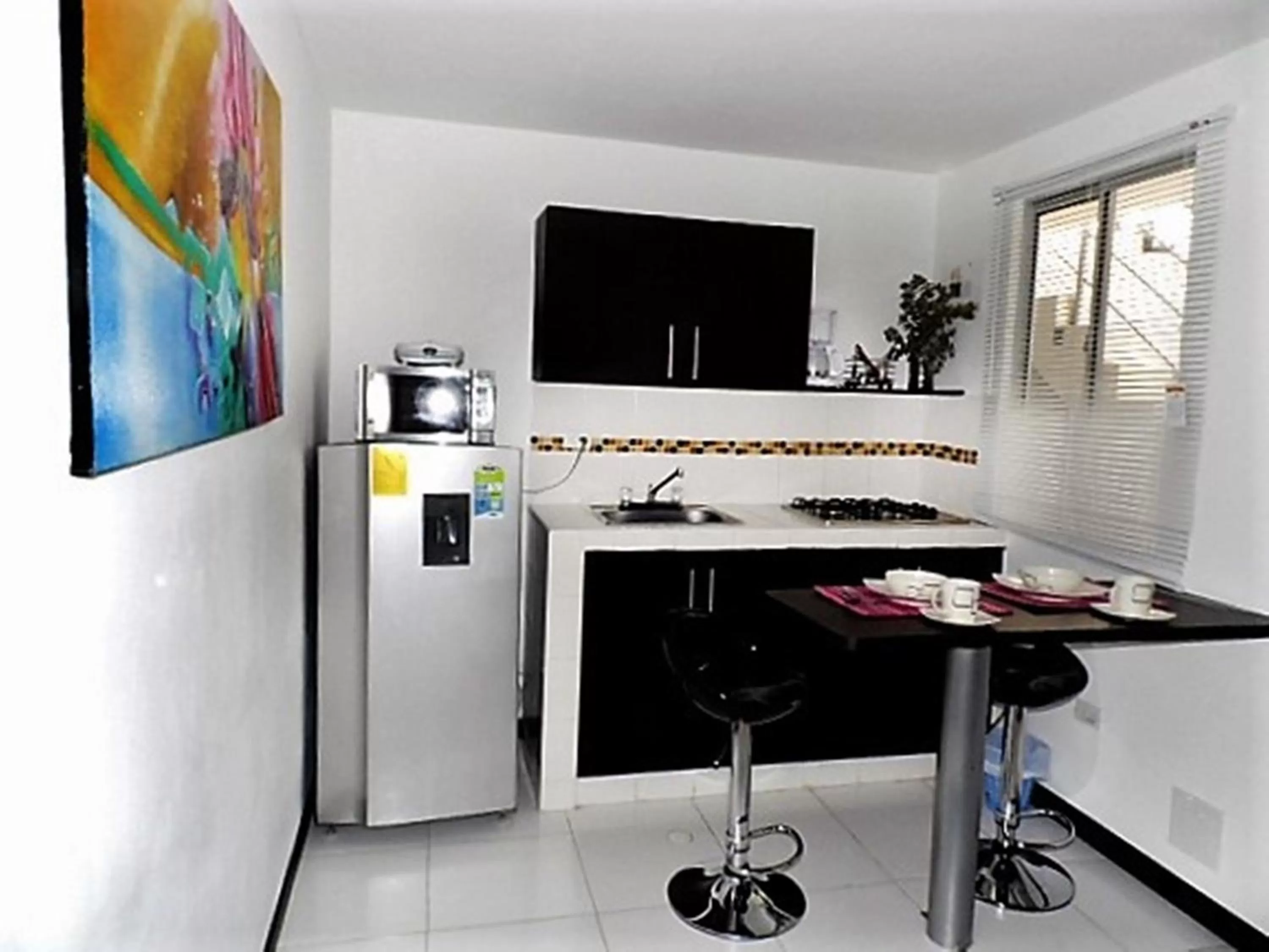 Dining area in Apartasuites San Marcos