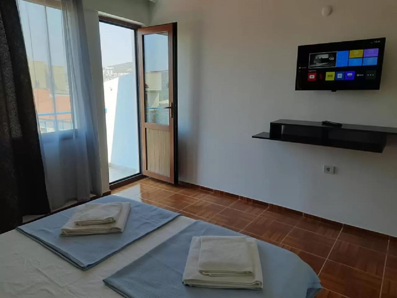 TV/Entertainment Center in Ephesian Hotel & Guesthouse