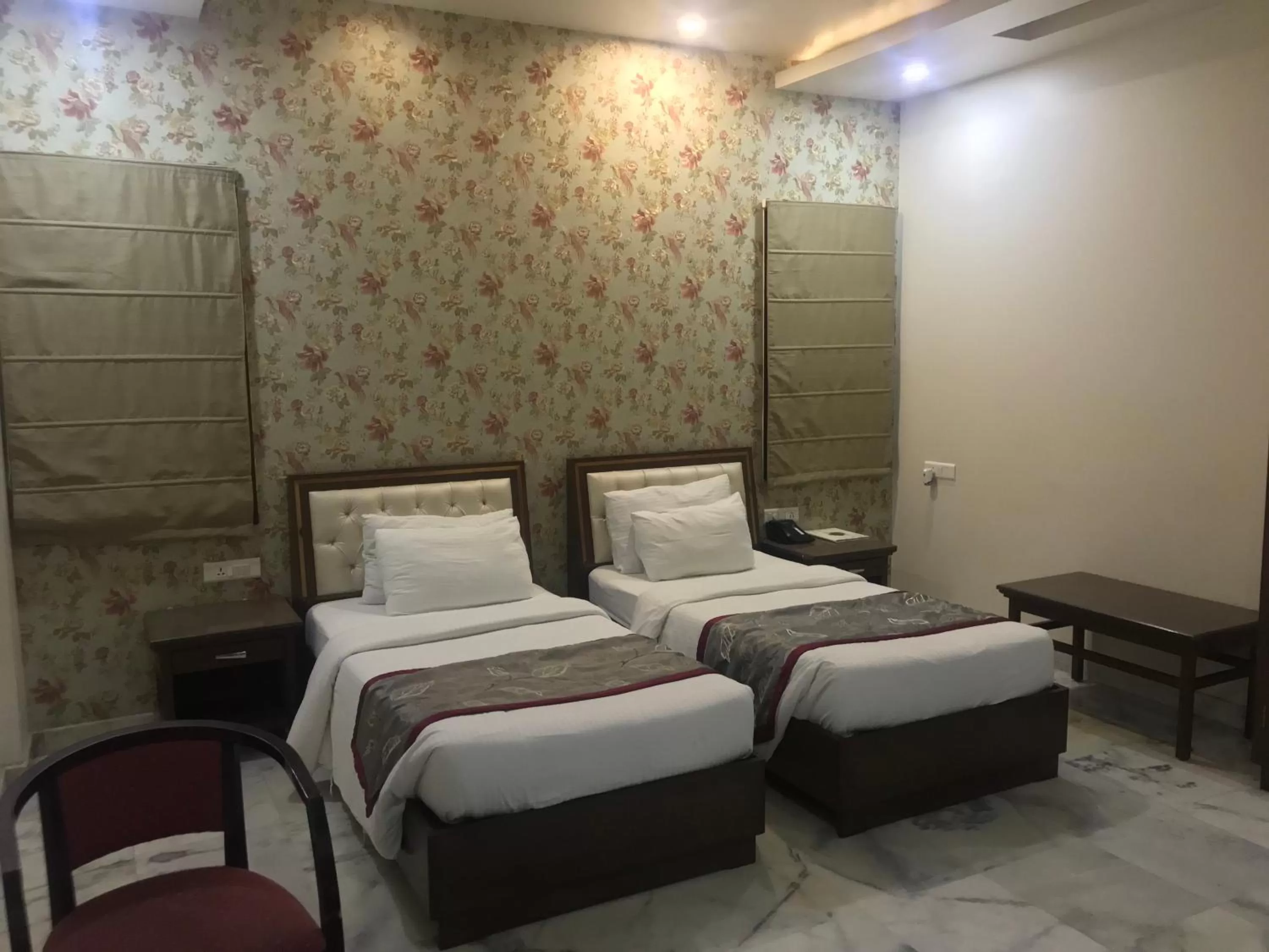 Bed in Hotel Leela Grande