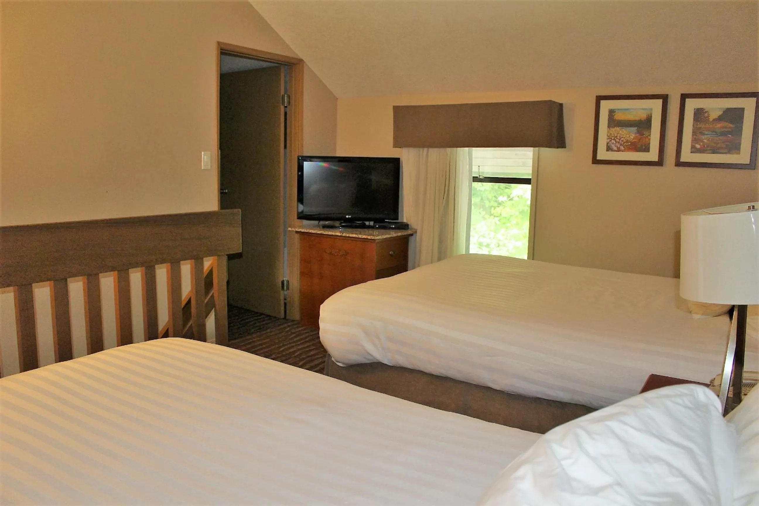 Bed in Ramada by Wyndham Campbell River