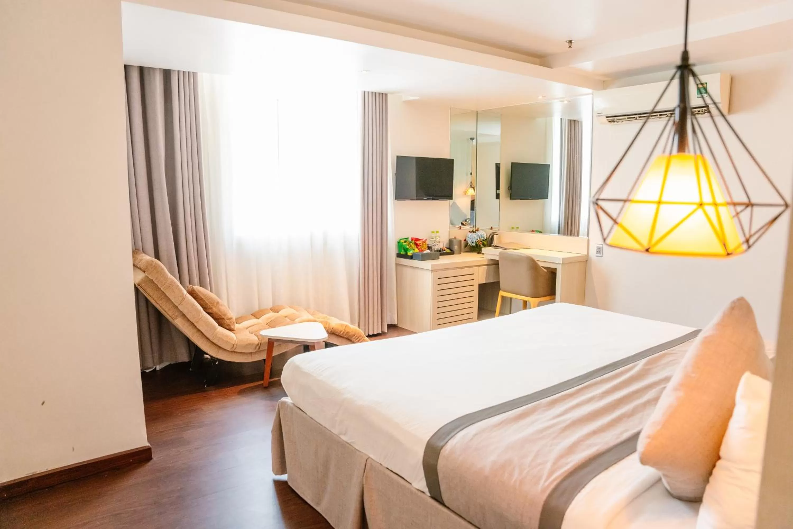 Bed in Holiday One Can Tho Hotel