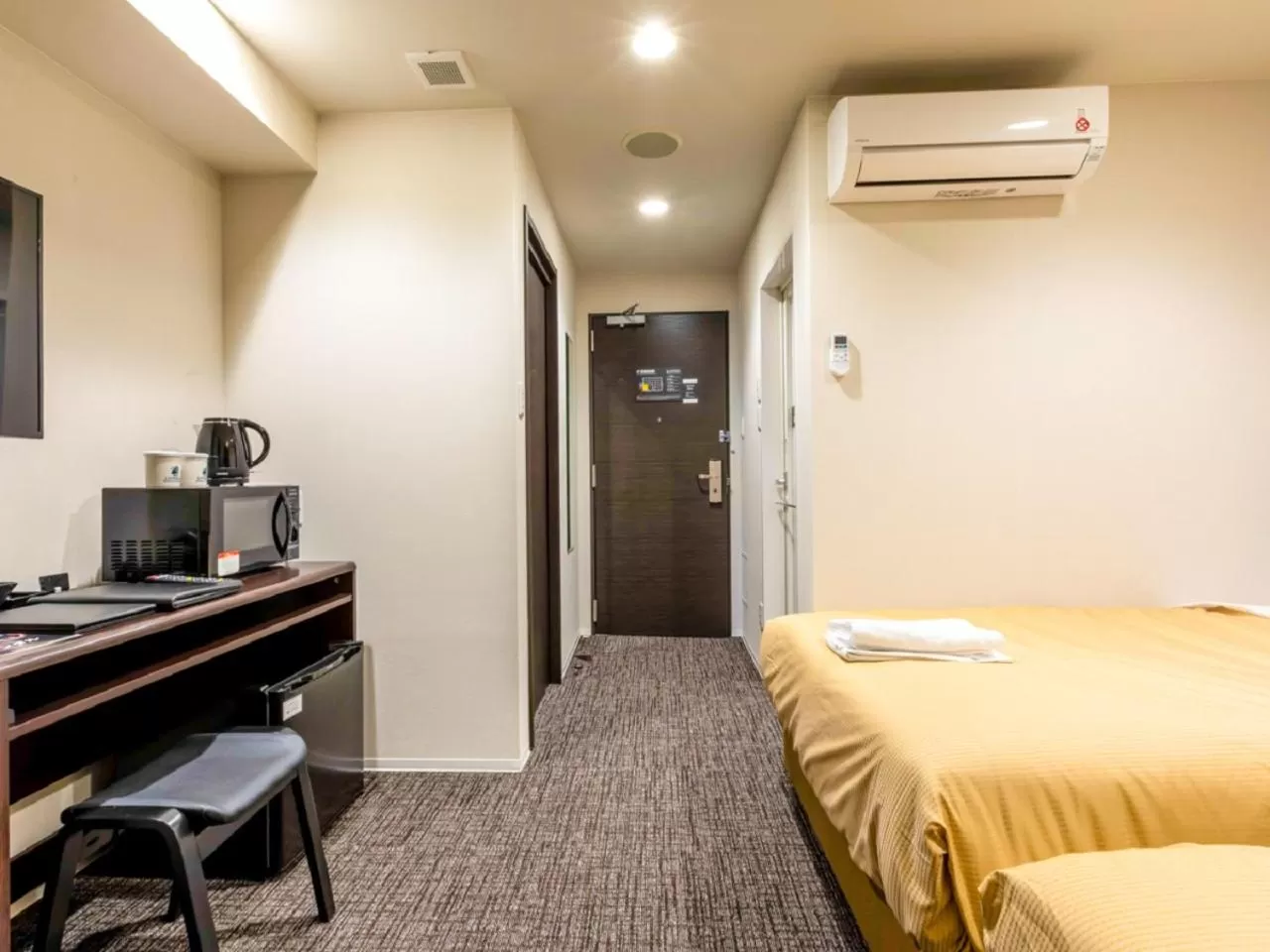 Bed in HOTEL LiVEMAX Okazaki