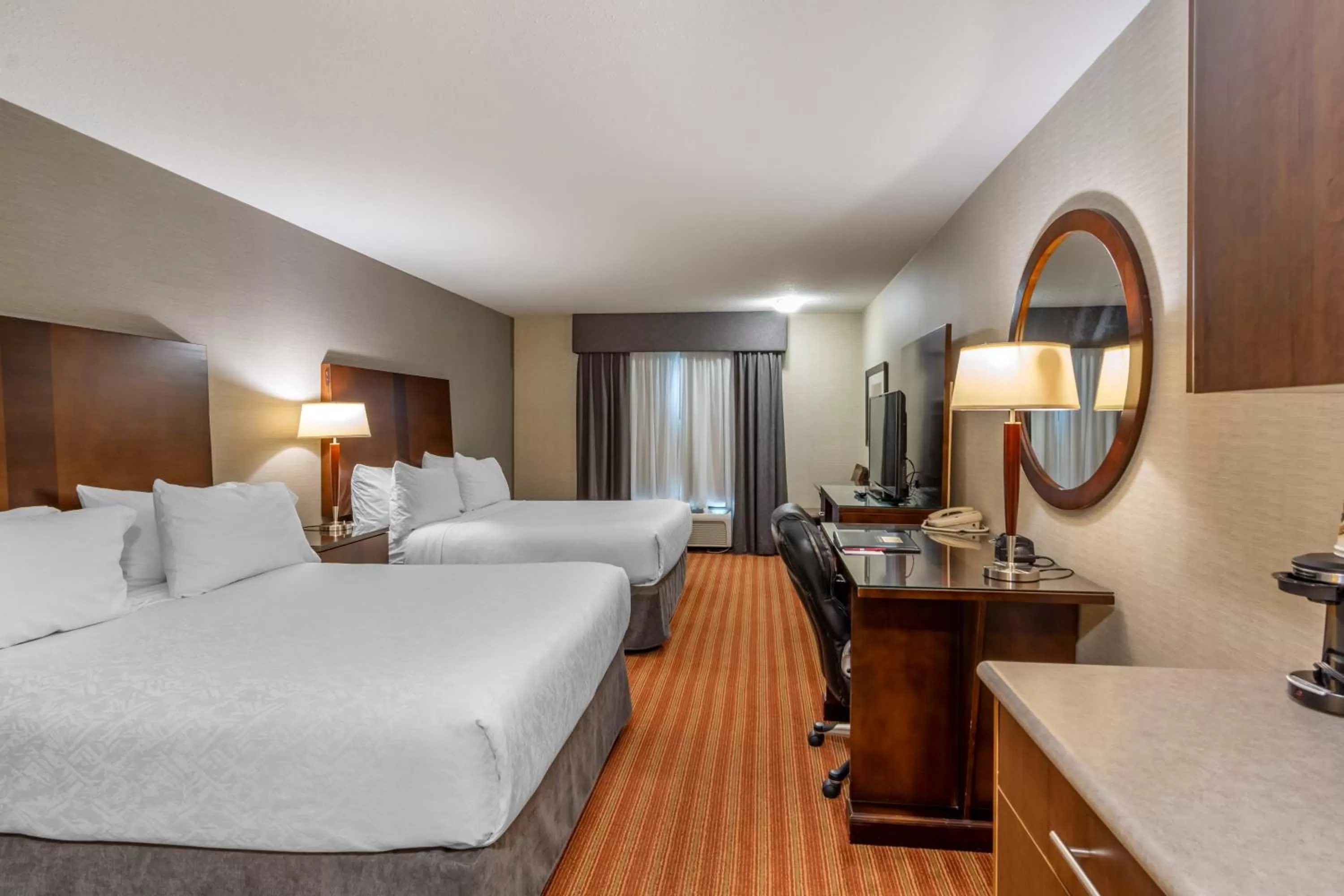 Photo of the whole room, Bed in Devonian Hotel and Suites