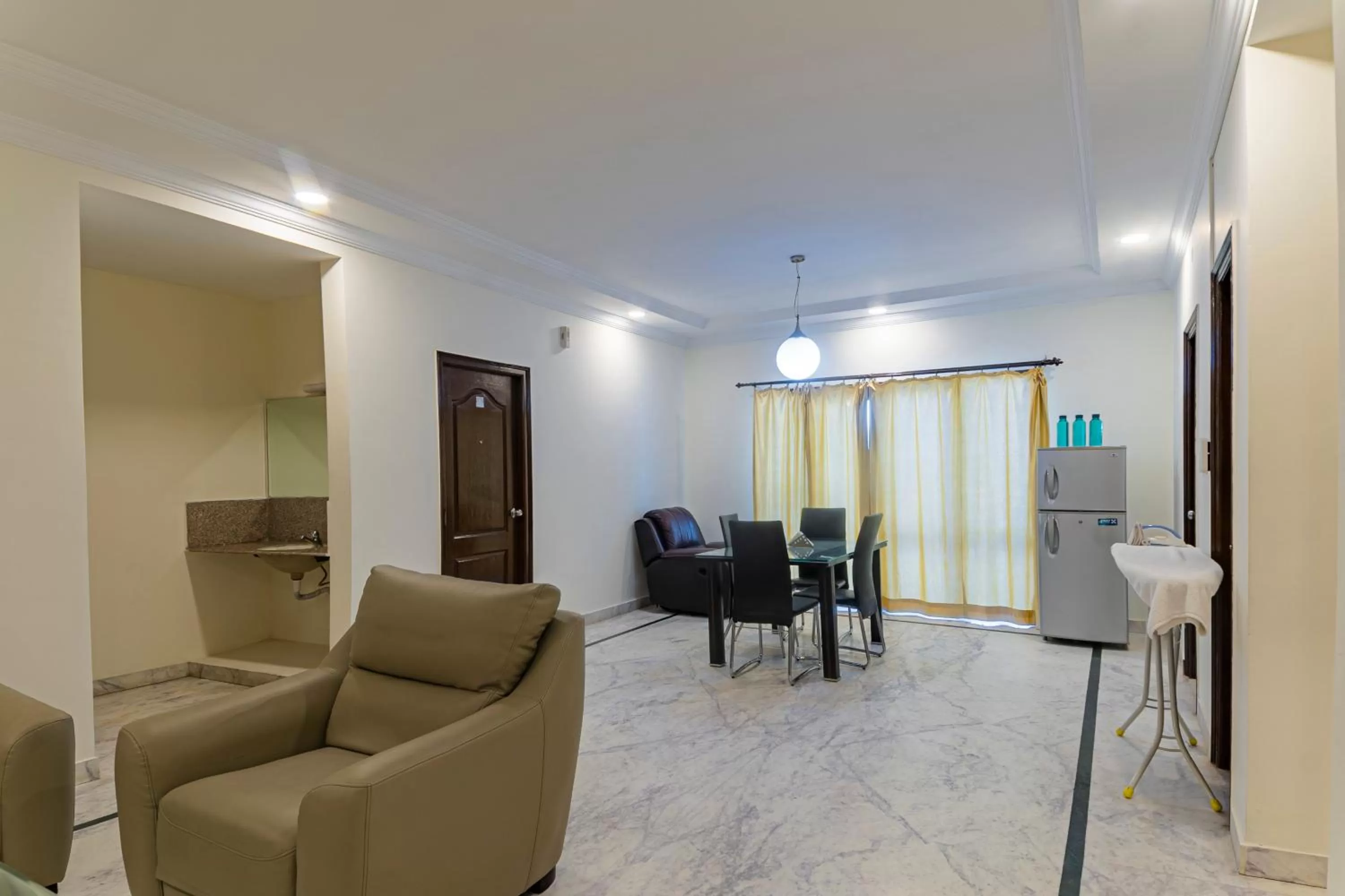 Living room in Hotel Athome & Serviced Apartments by Deccan Serai Hotels