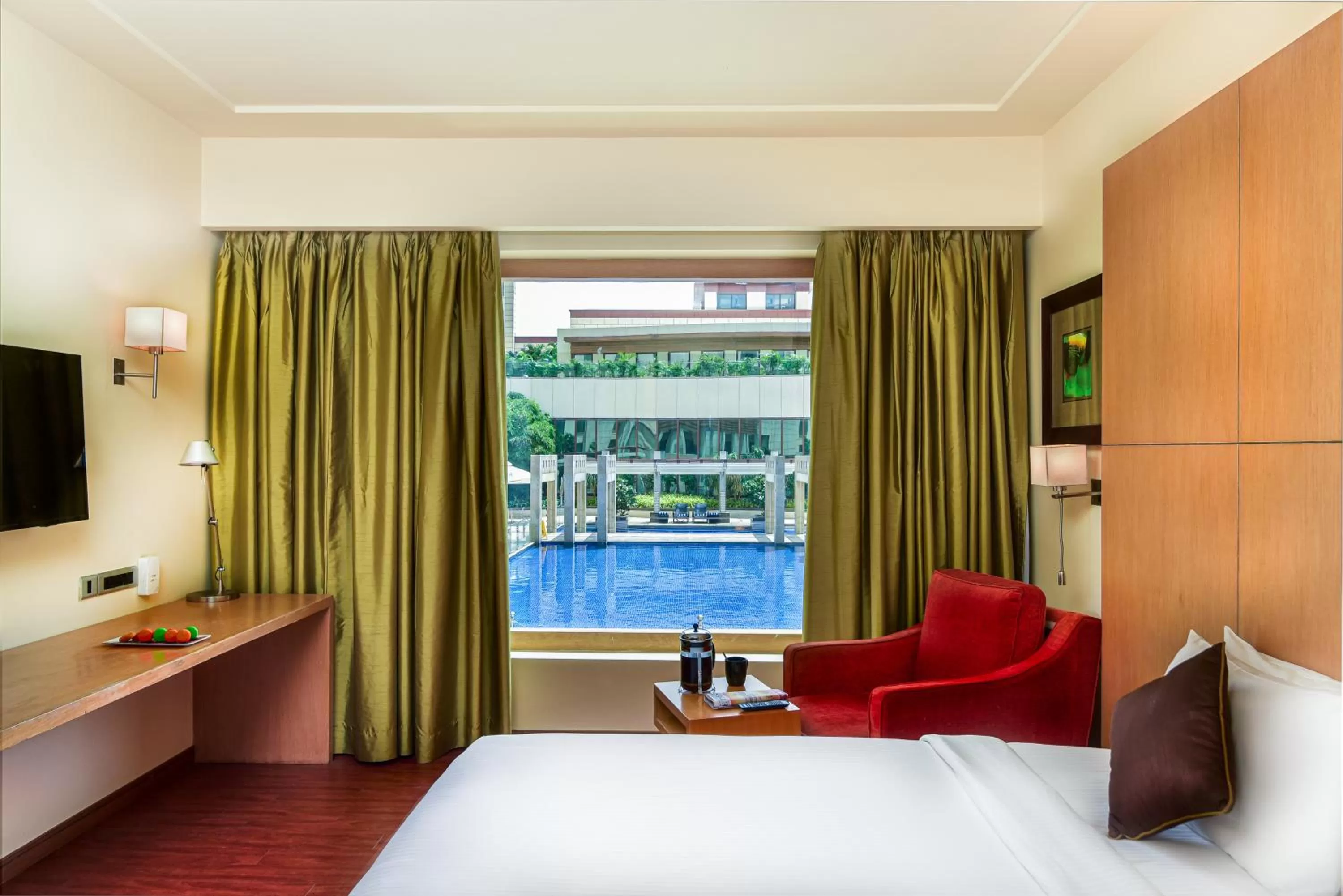 Pool view, Bed in Novotel Hyderabad Airport