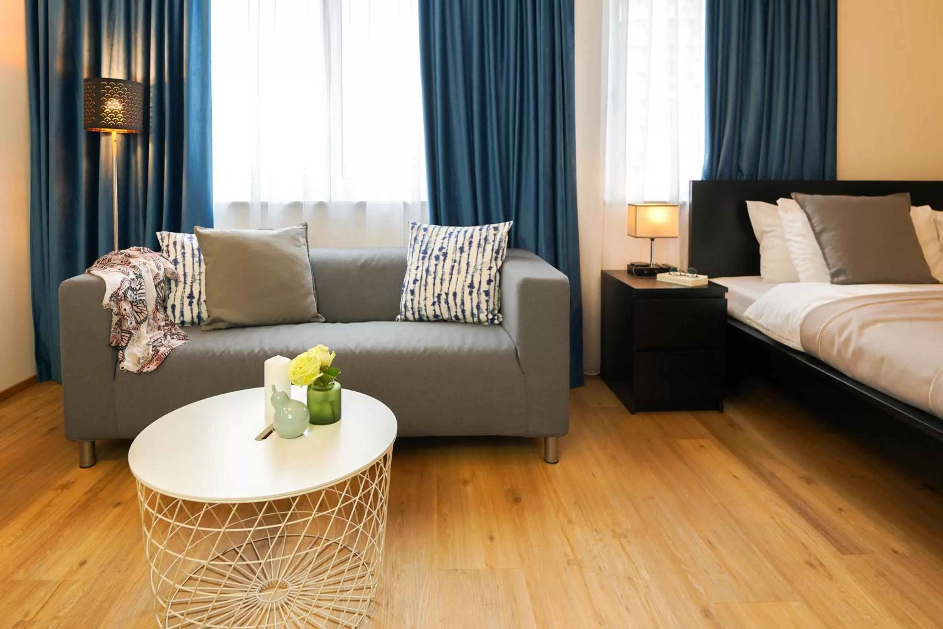 Living room, Bed in Citadines South Vienna