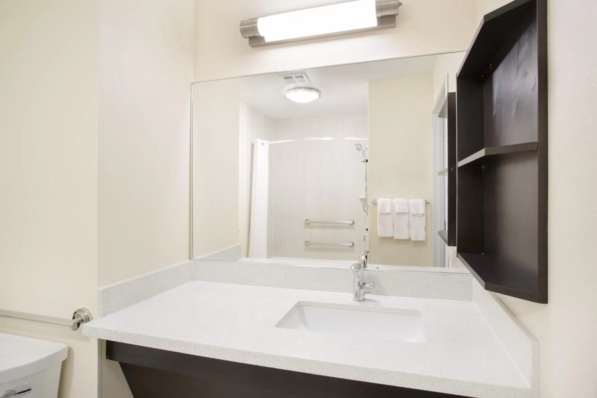 Bathroom in Candlewood Suites Longmont - Boulder Area by IHG