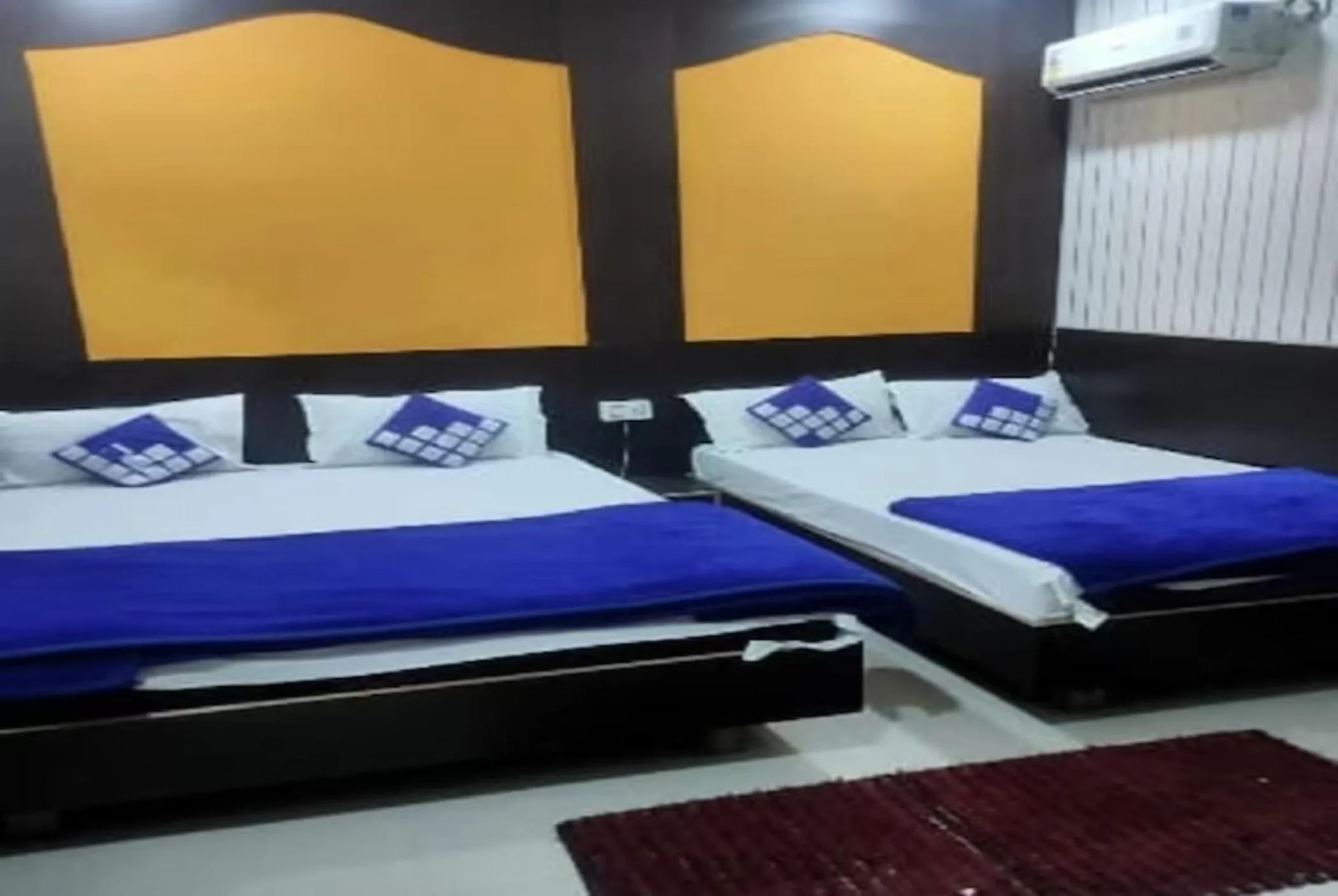 Bed in Goroomgo New Ashiyana Palace Varanasi