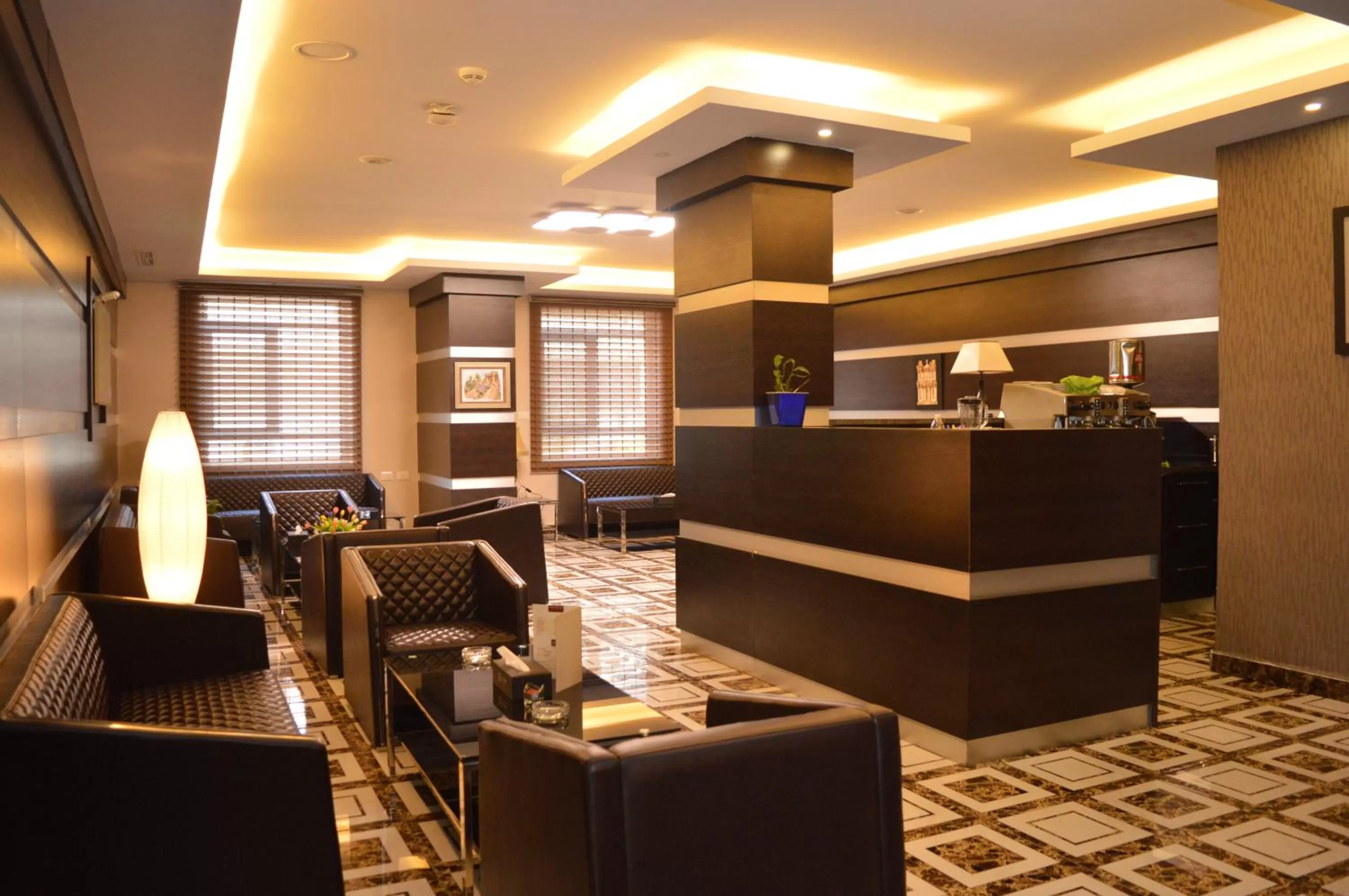 Lounge or bar in Tilal Almadina Hotel & Suites