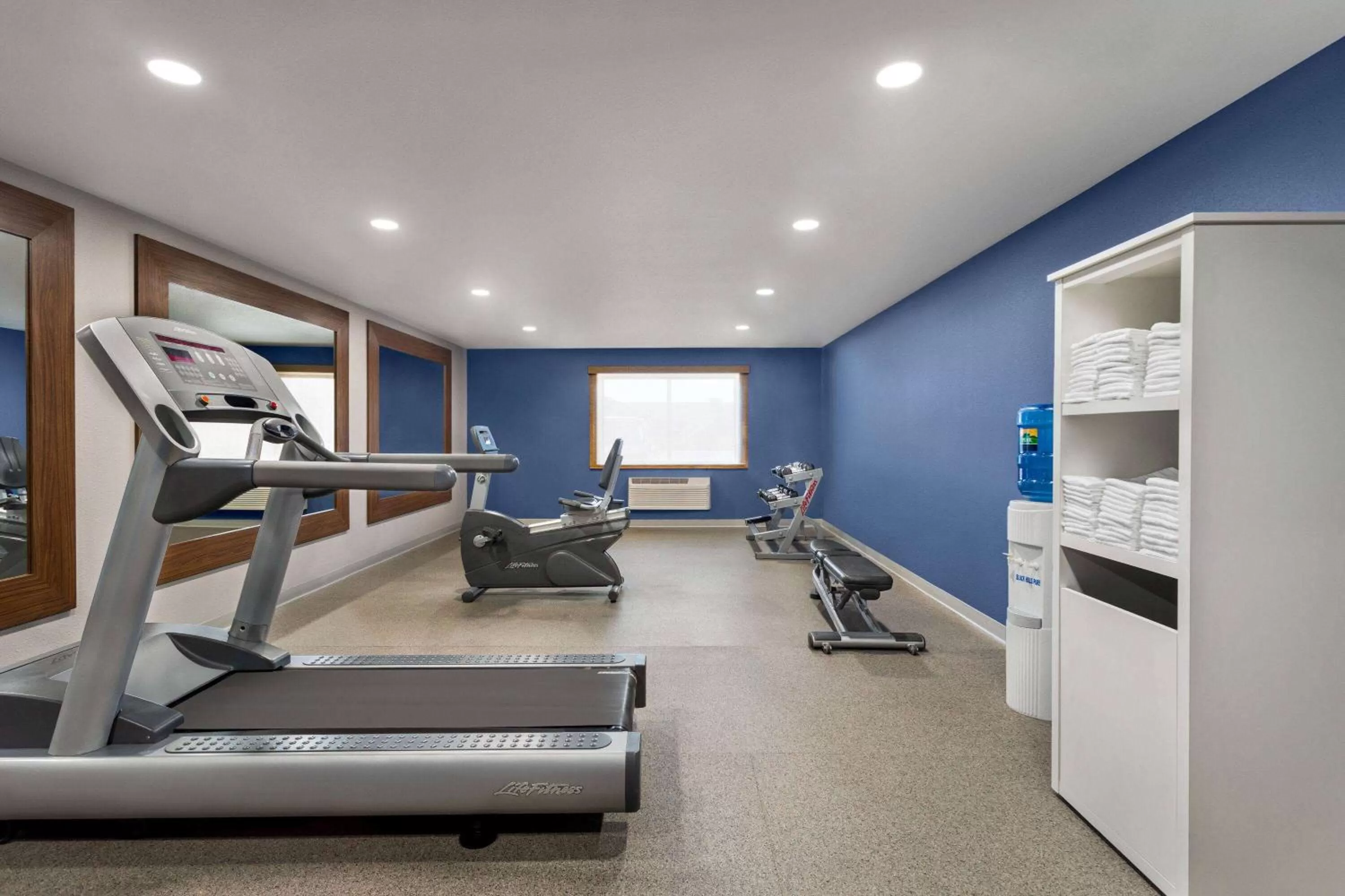 Fitness centre/facilities in AmericInn by Wyndham Rapid City